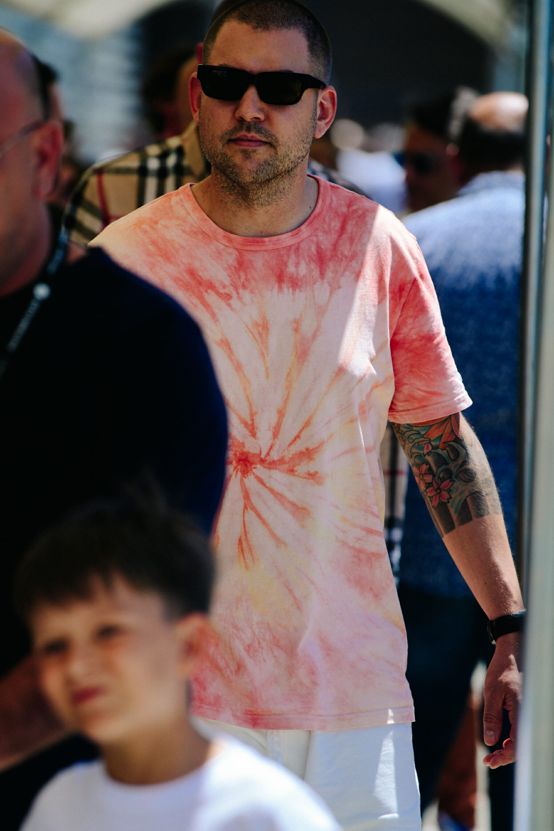 Man wearing tie dye shirt