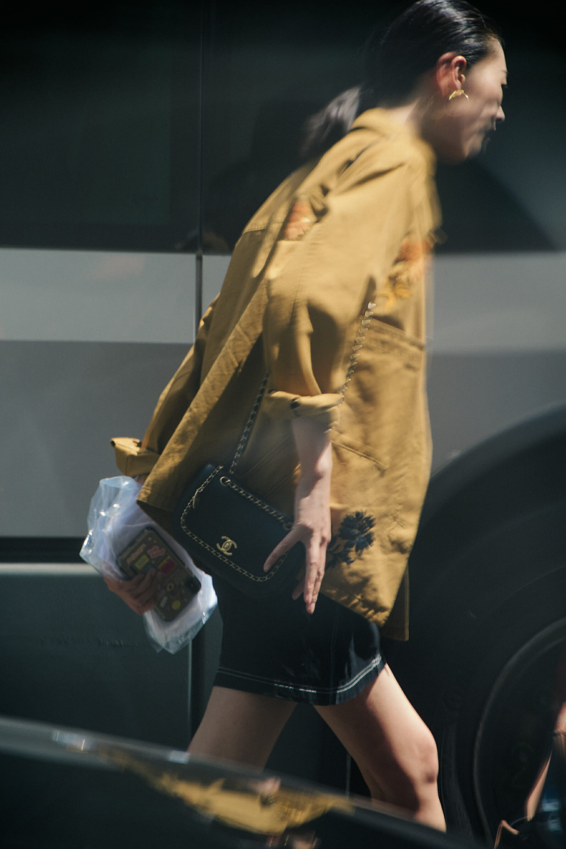 Woman carrying Chanel bag