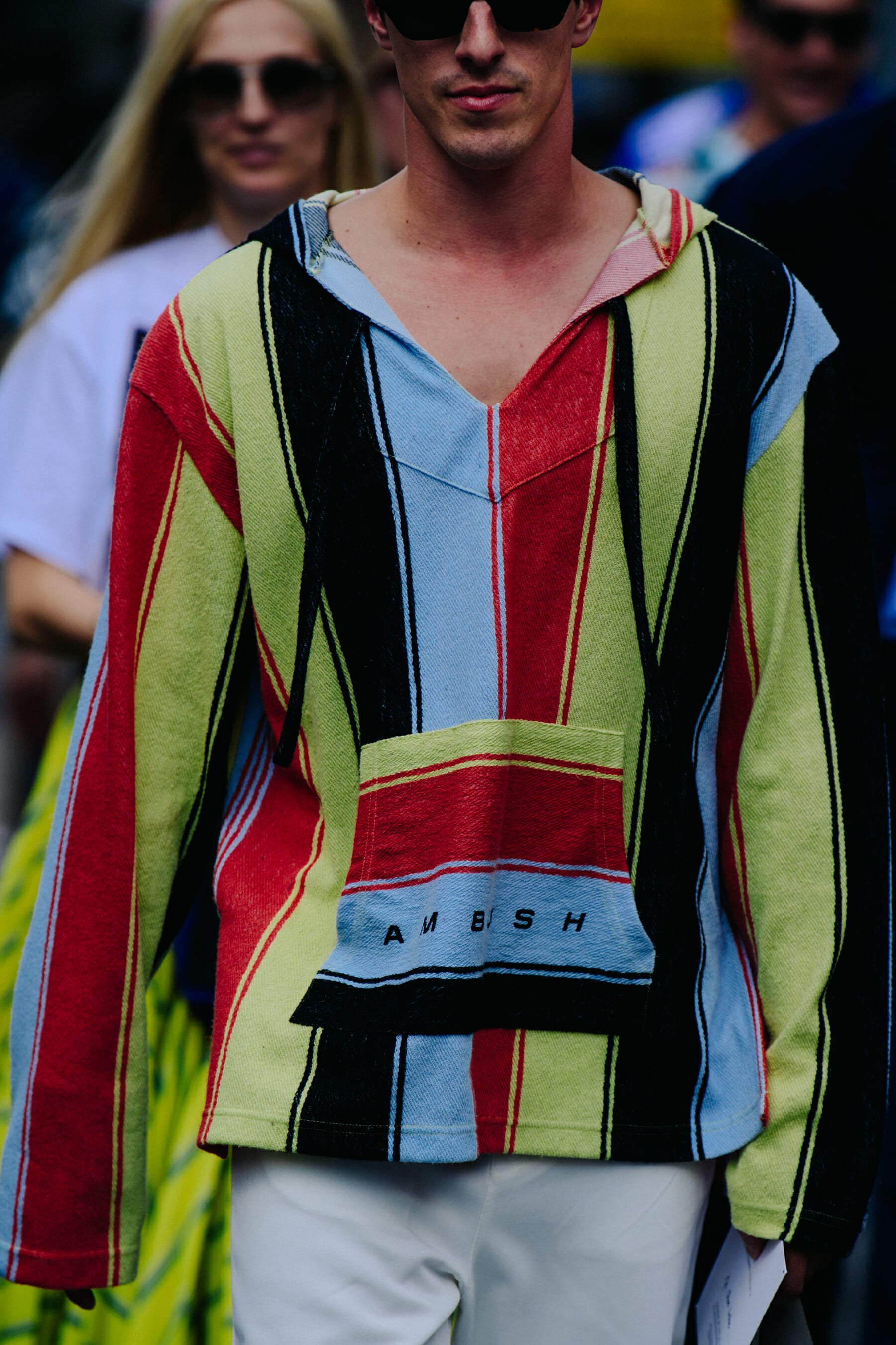 Man wearing Ambush shirt