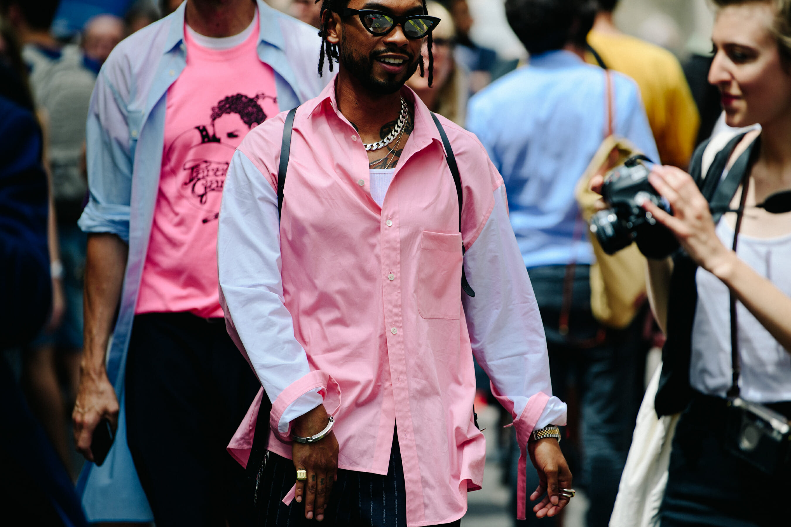 Man wearing pink shirt