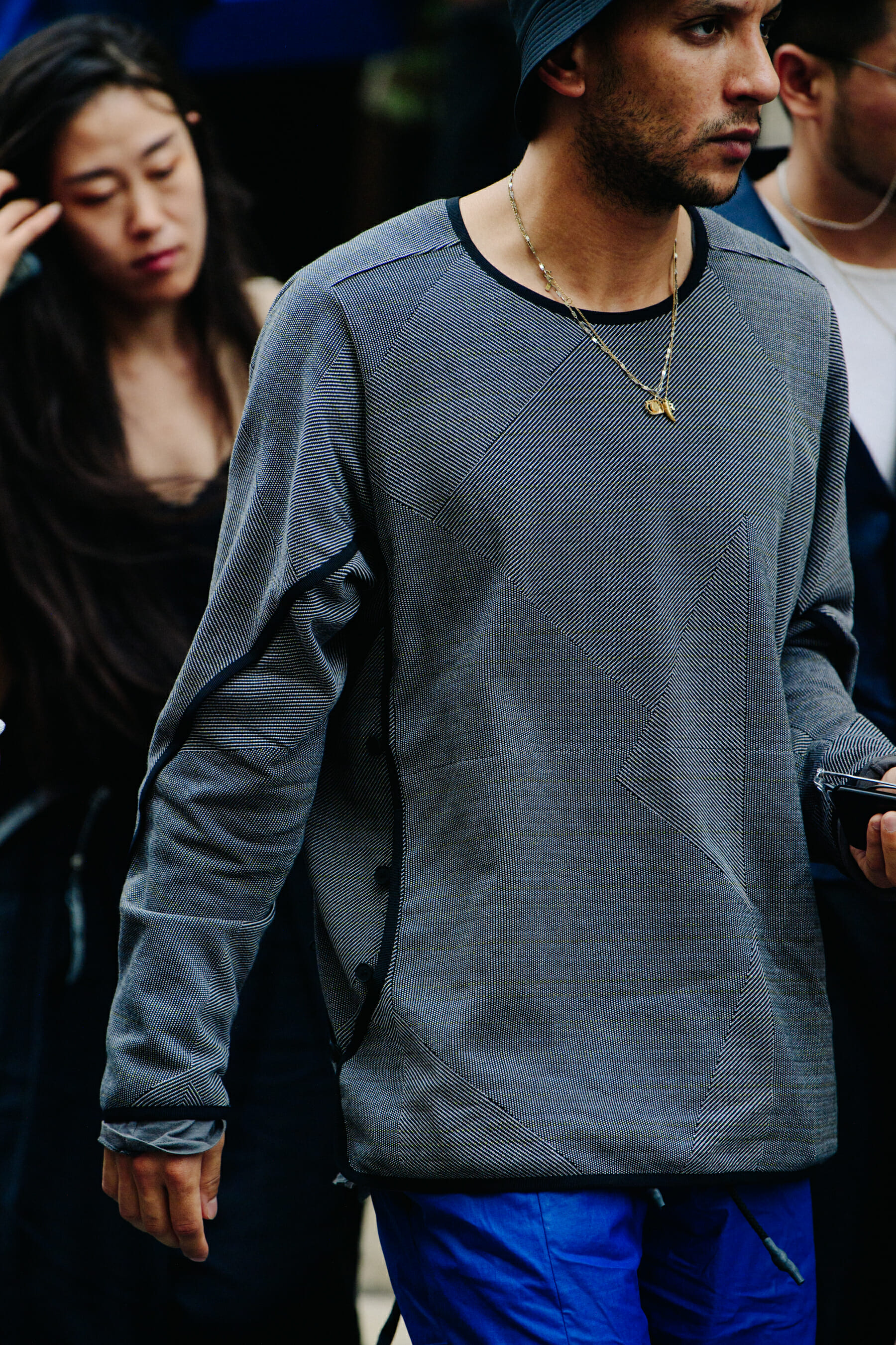 Man wearing grey jumper