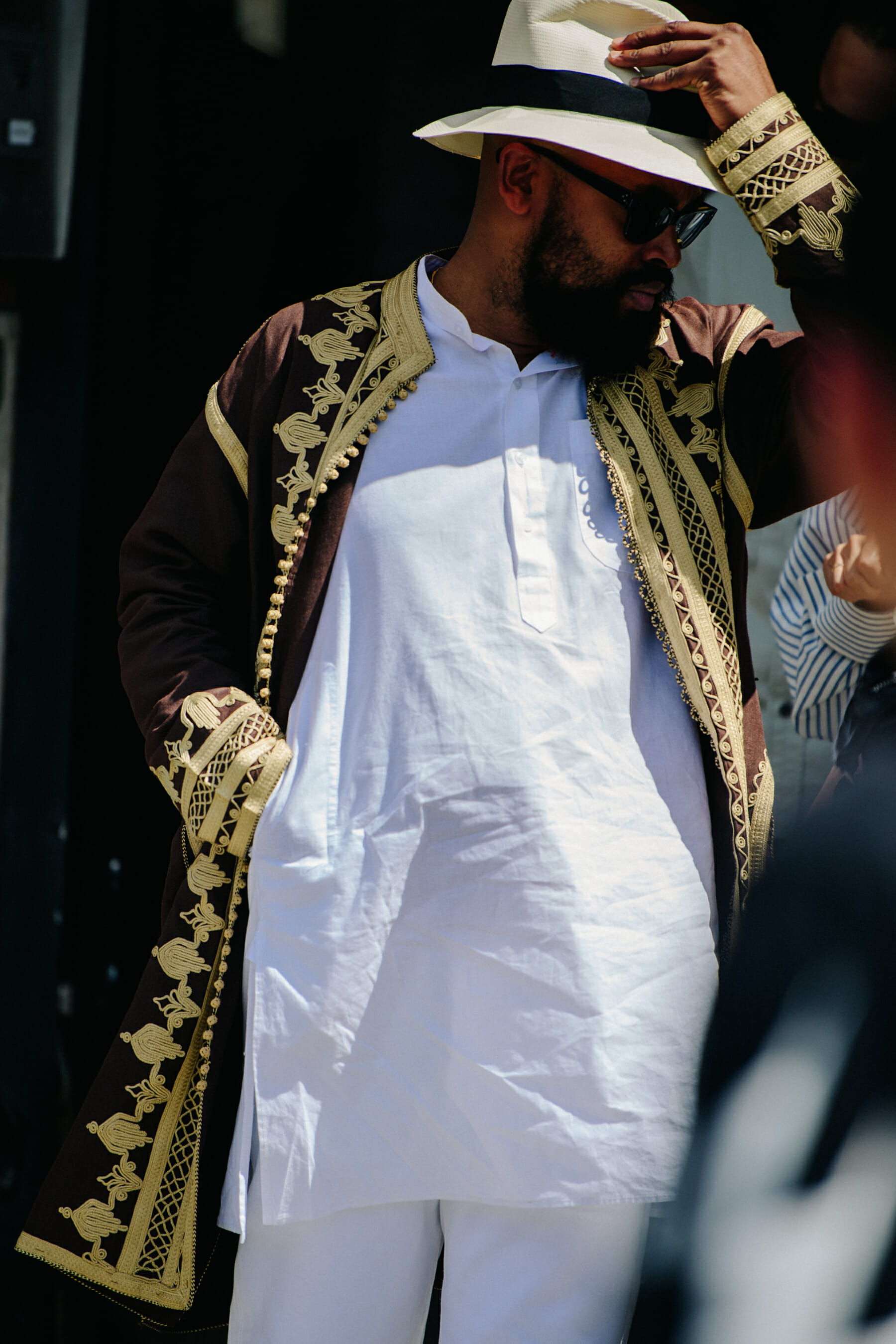 Man wearing white tunic