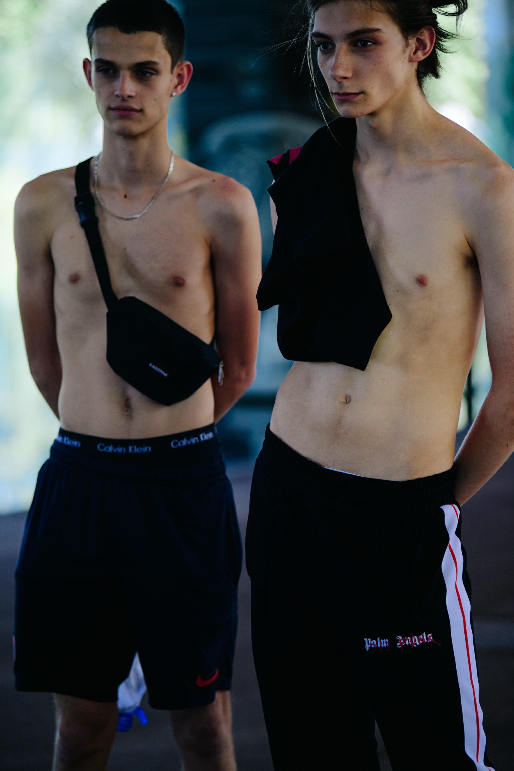 Two topless male models