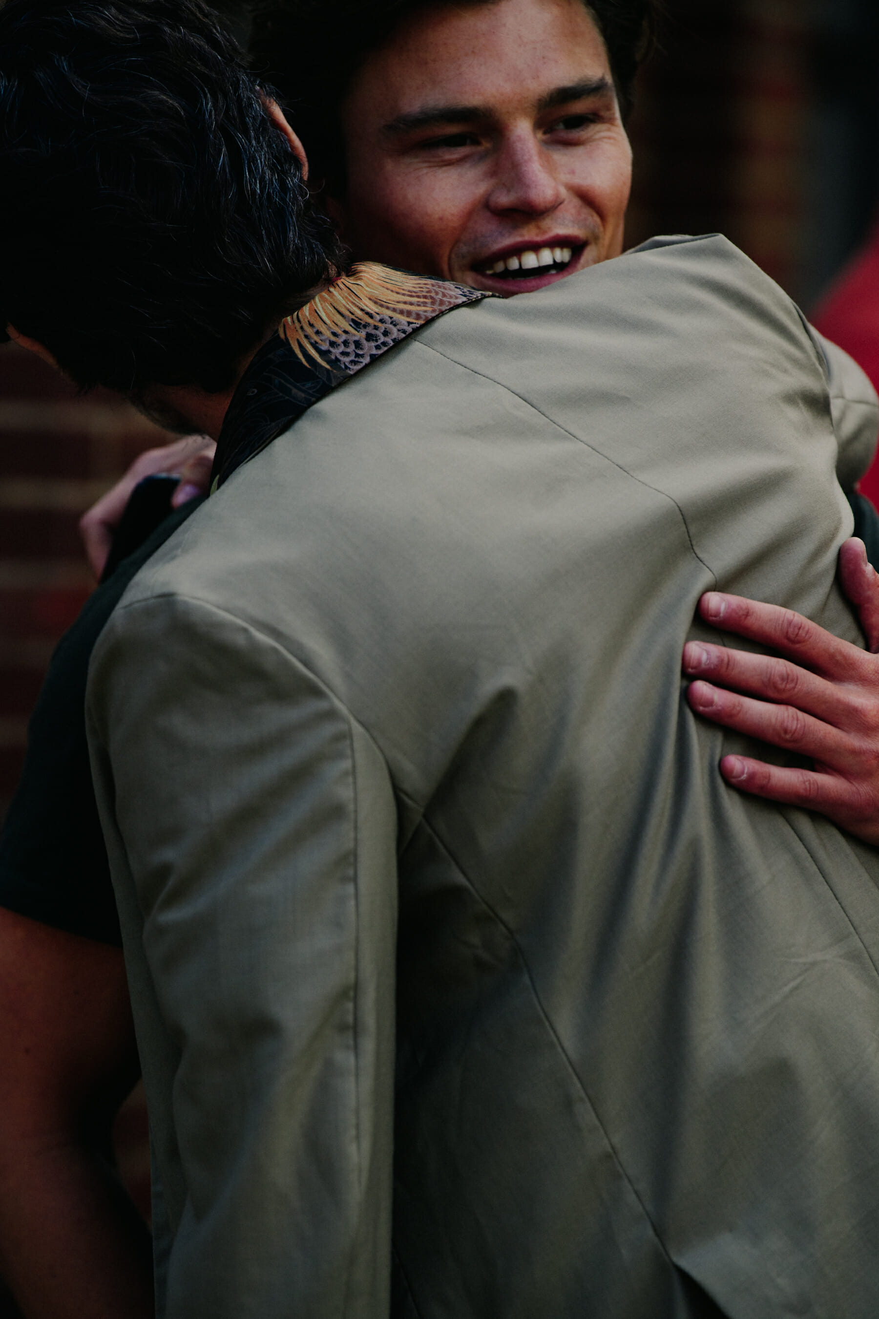 Two models hugging