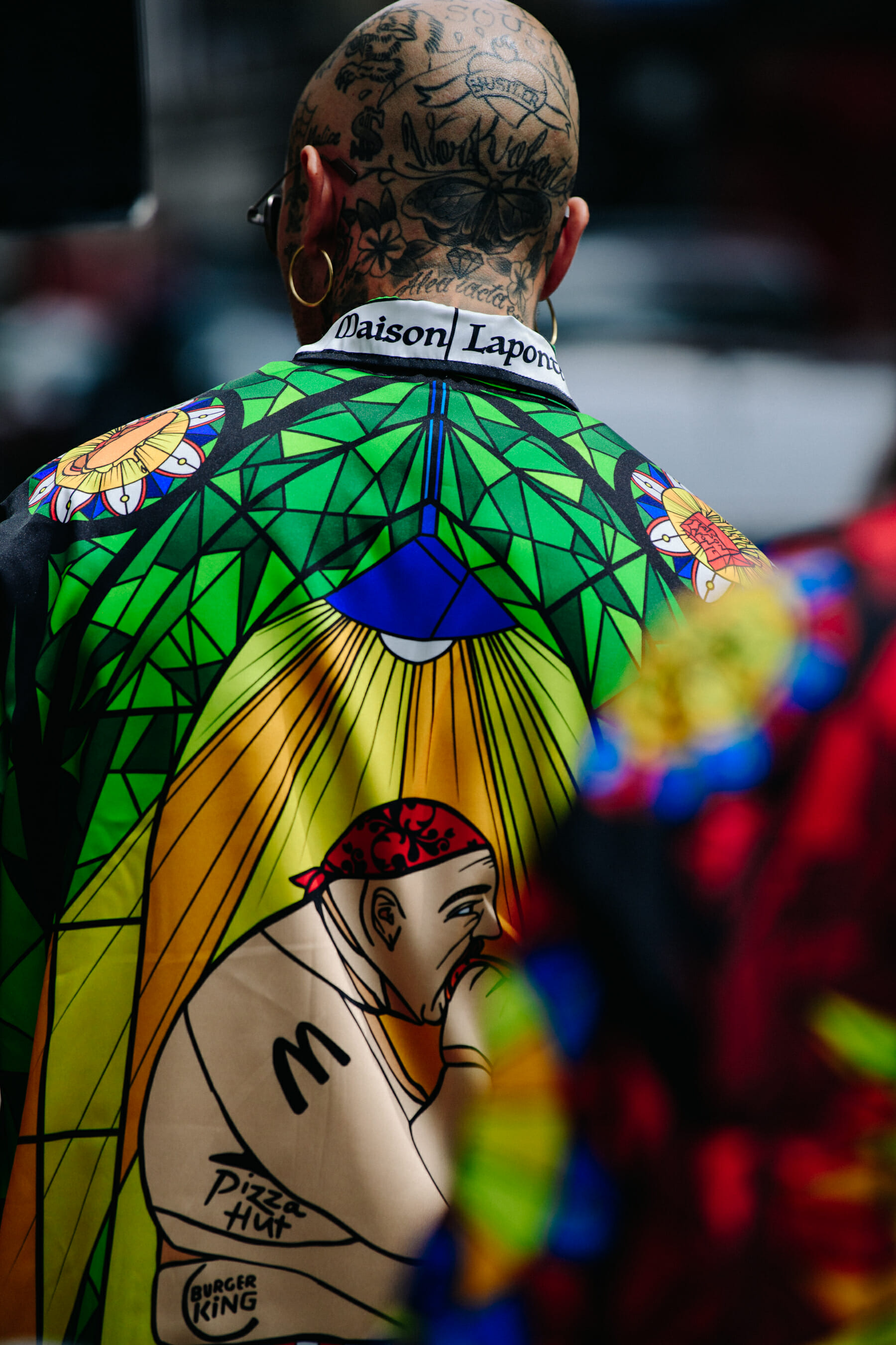Man wearing colourful outfit