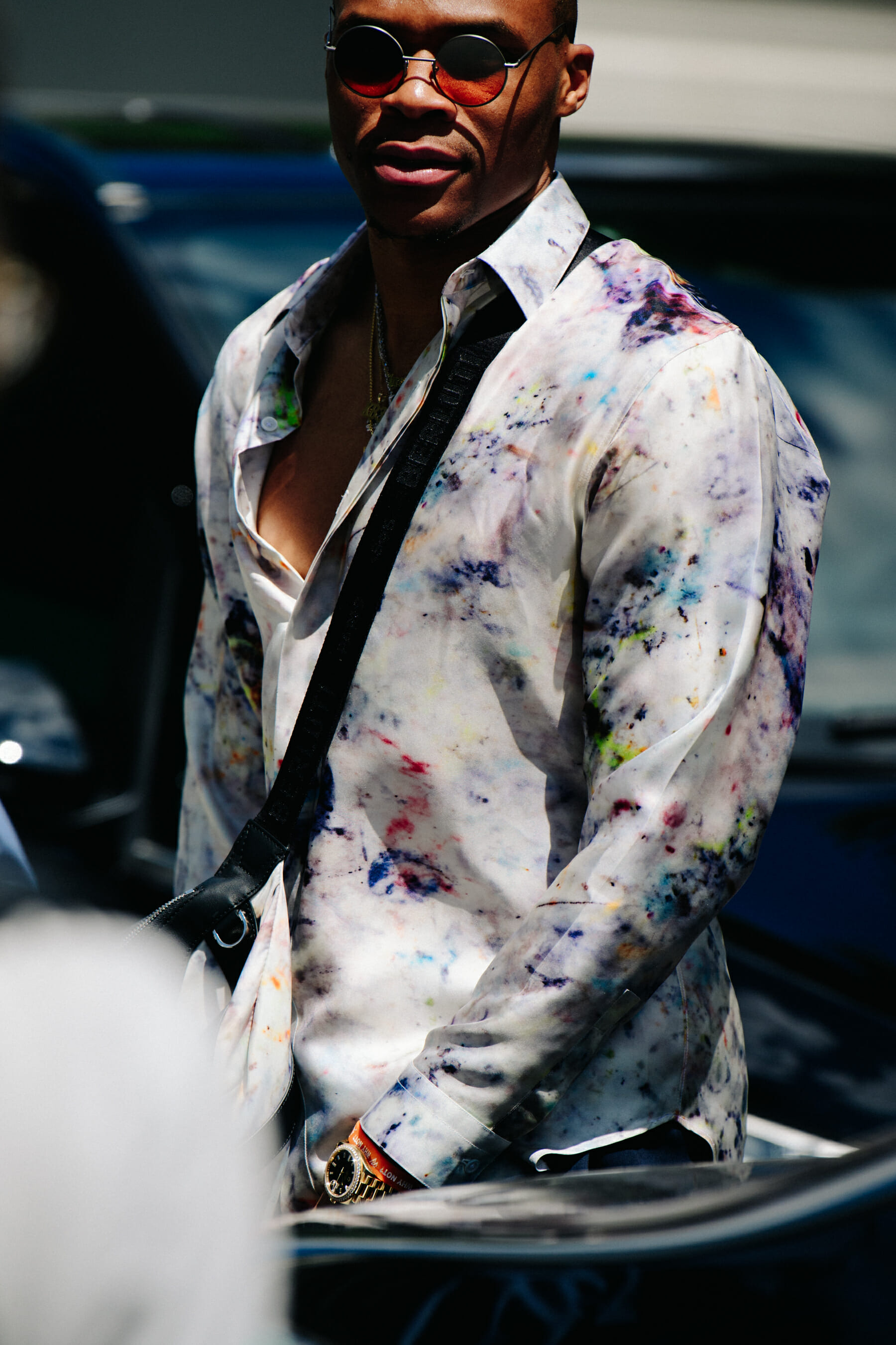 Man wearing colourful shirt