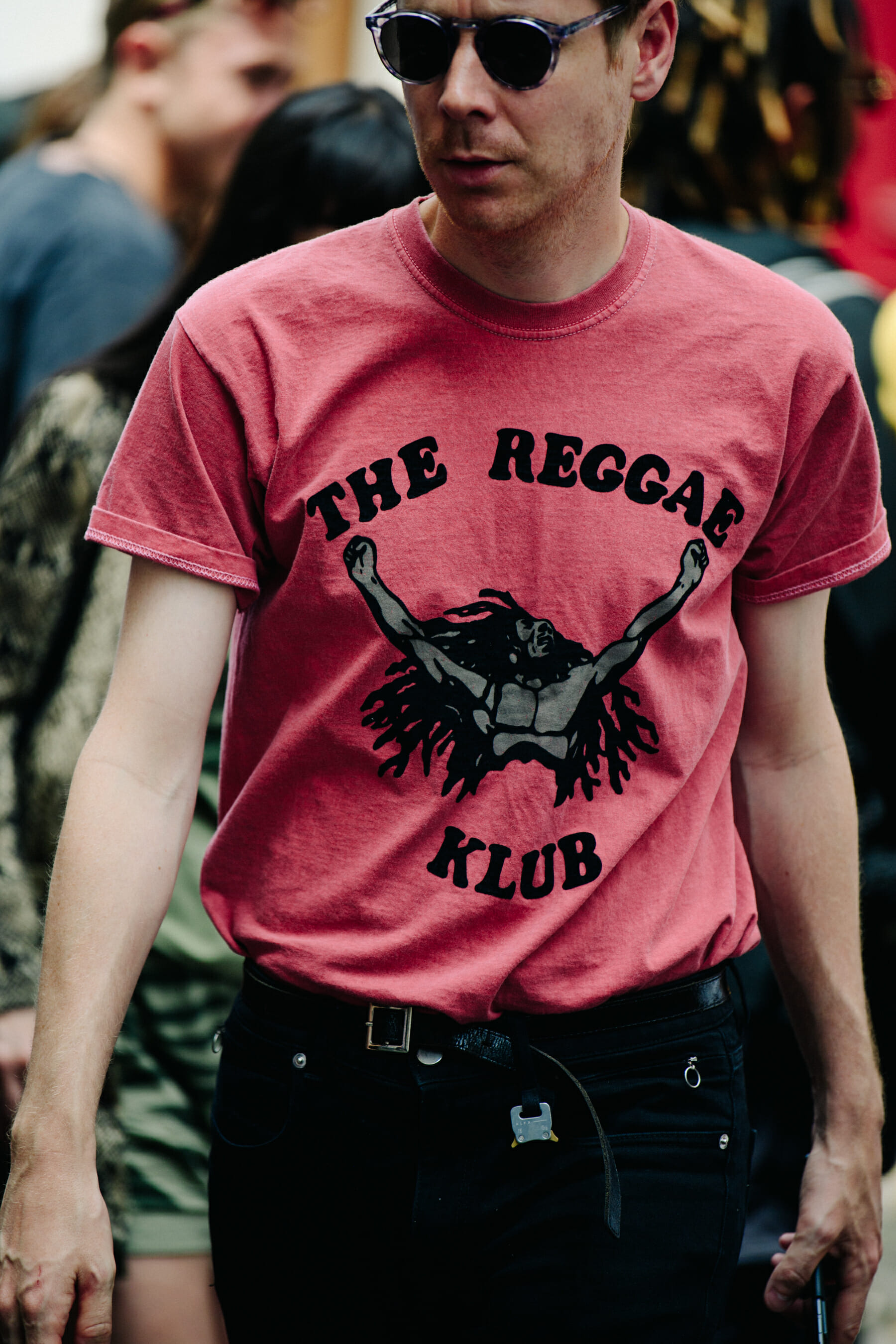 Man wearing pink shirt