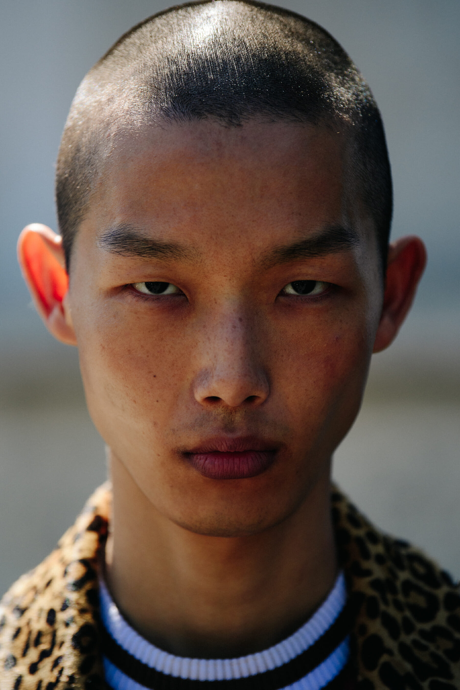 Portrait of model with shaved head
