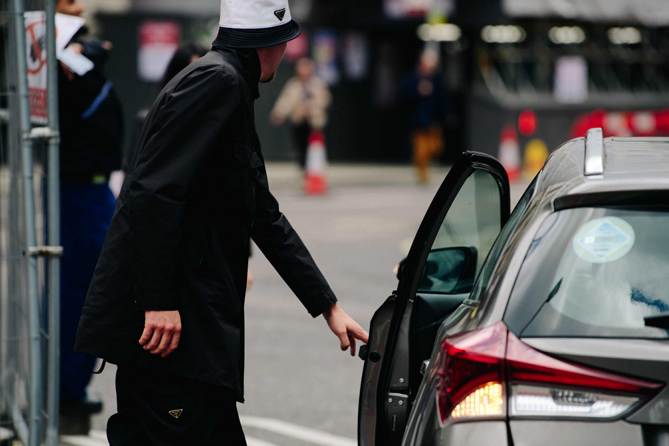 Man wearing Prada hat