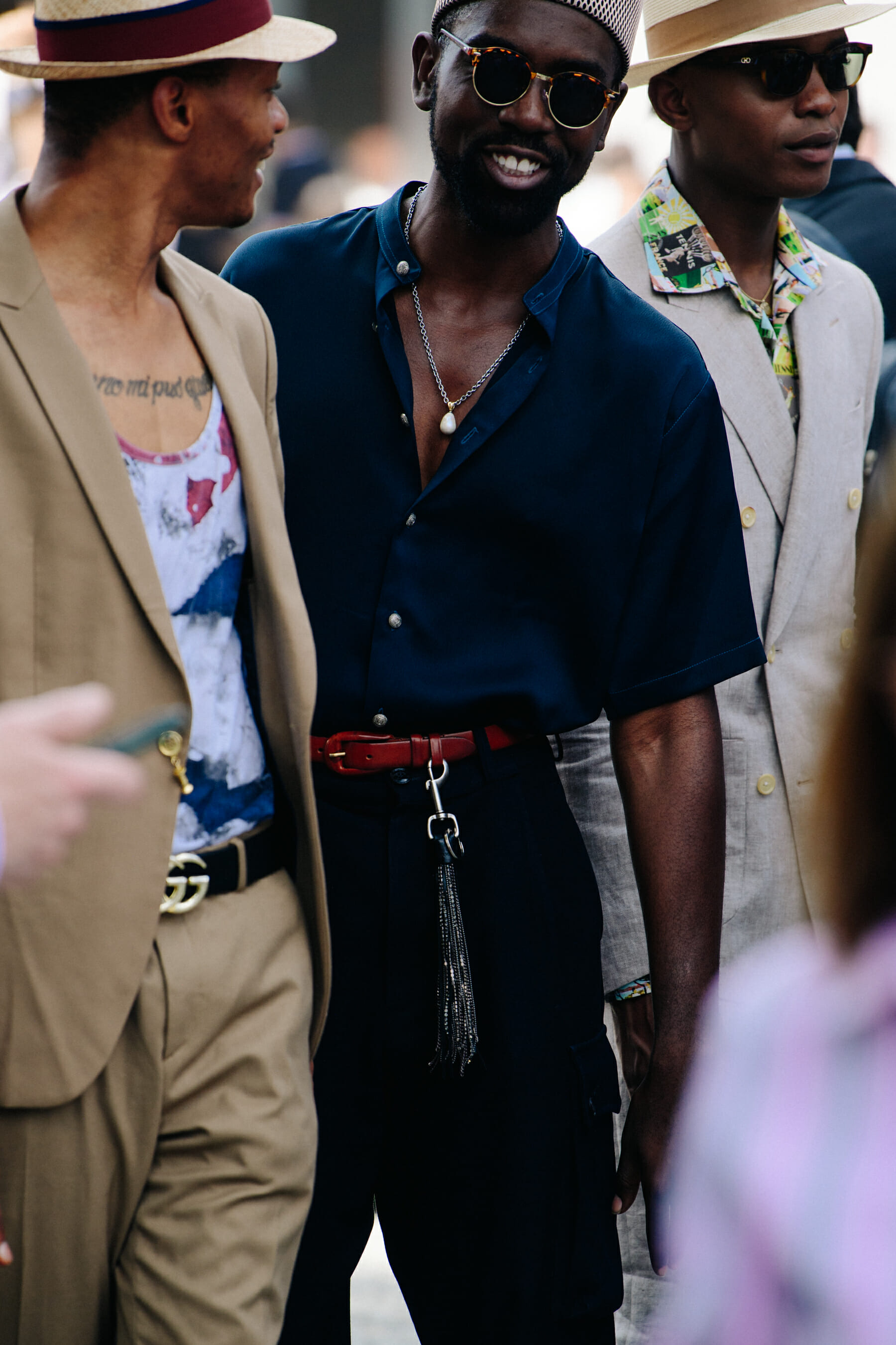 Man wearing dark open collar shirt