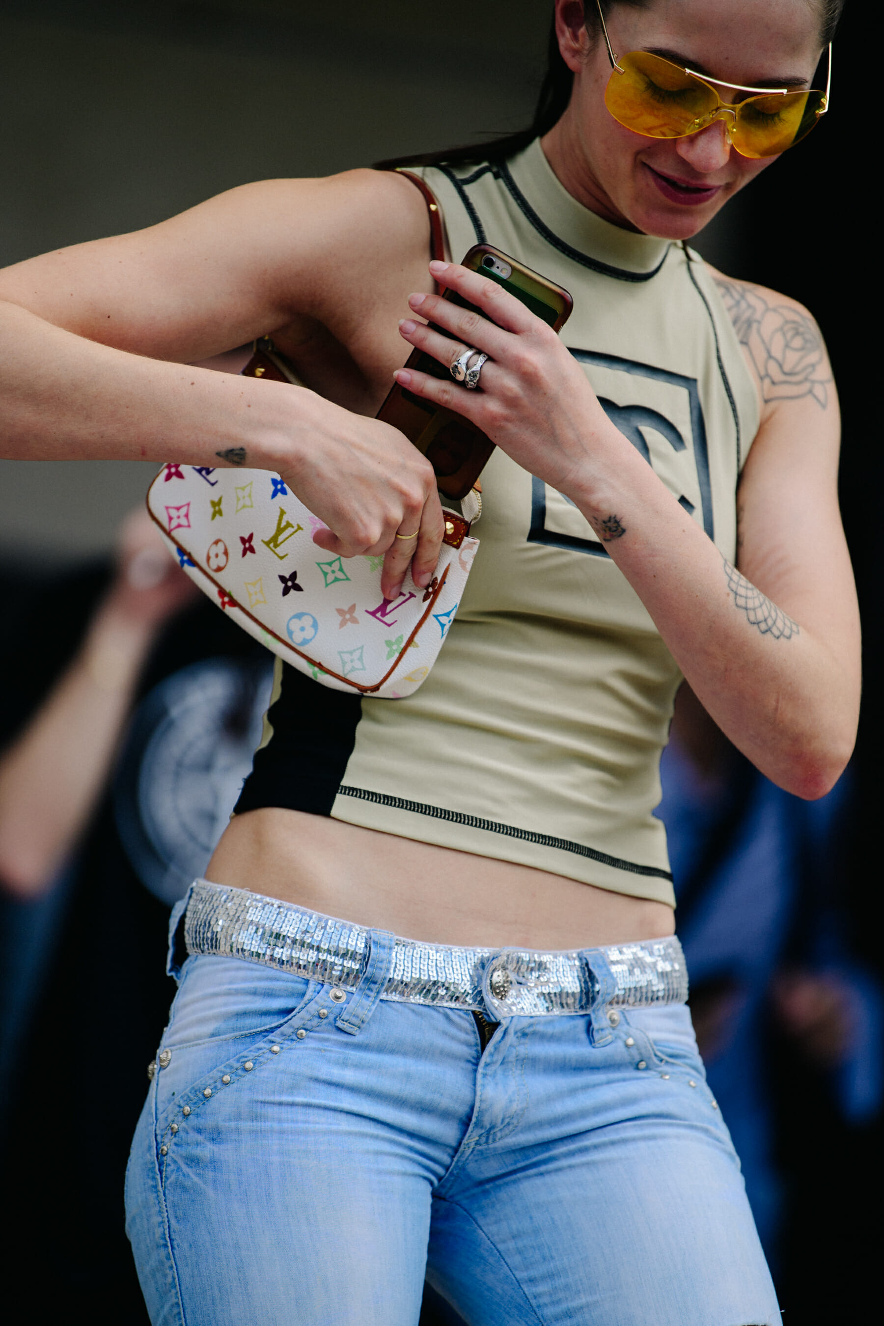 Woman carrying Louis Vuitton bag