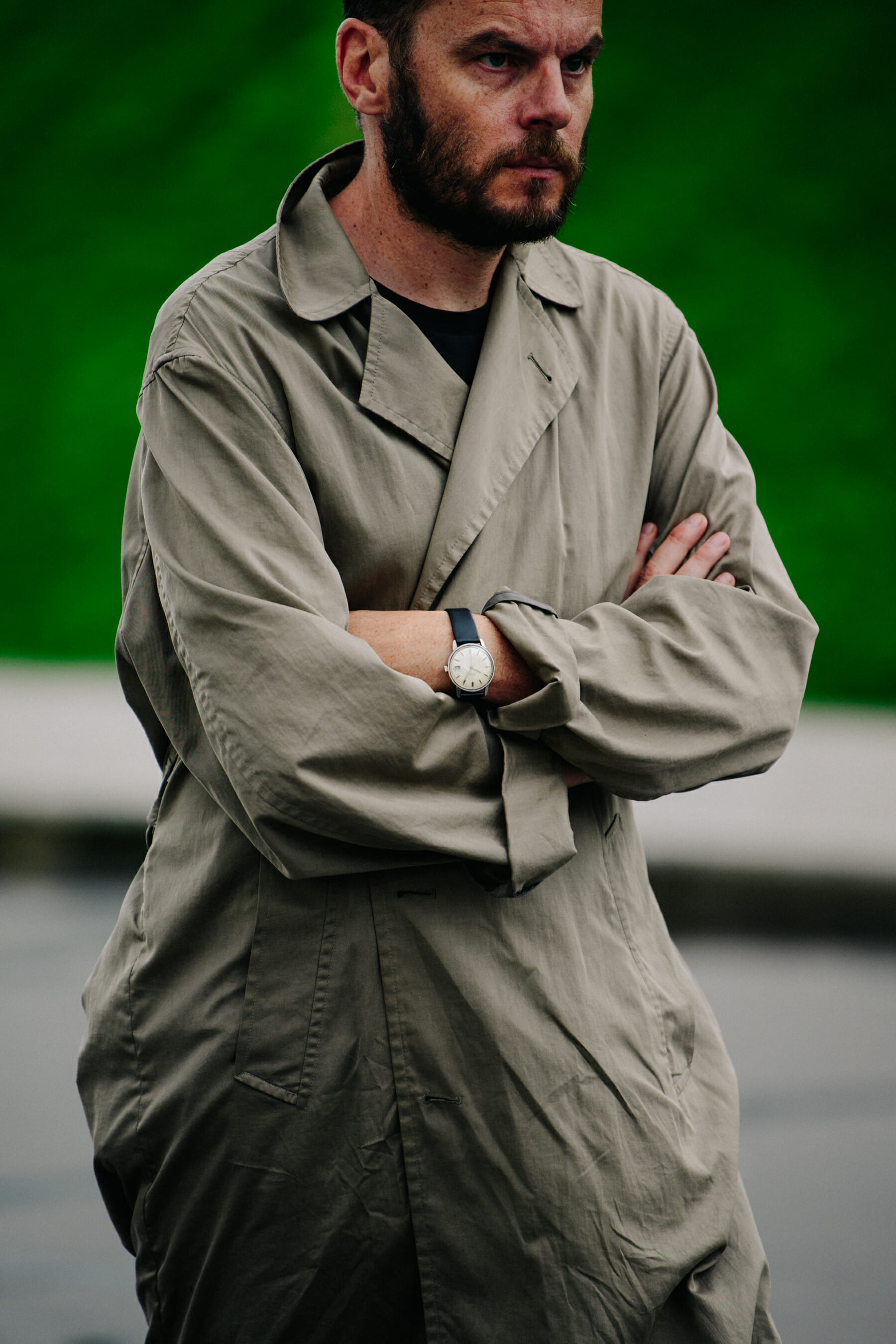 Man wearing tan coat