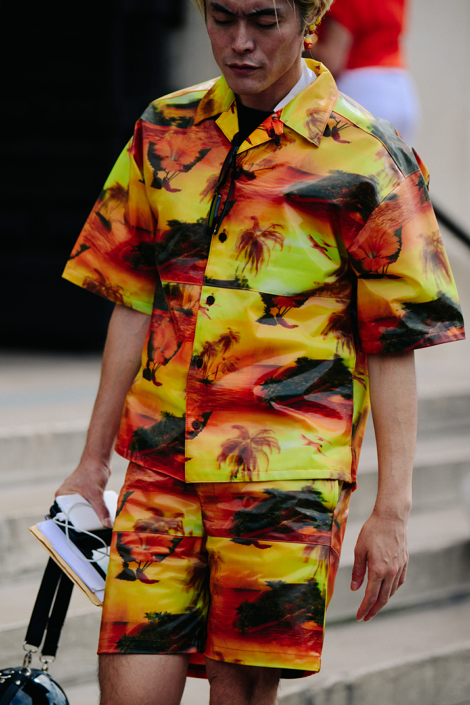 Man wearing orange outfit