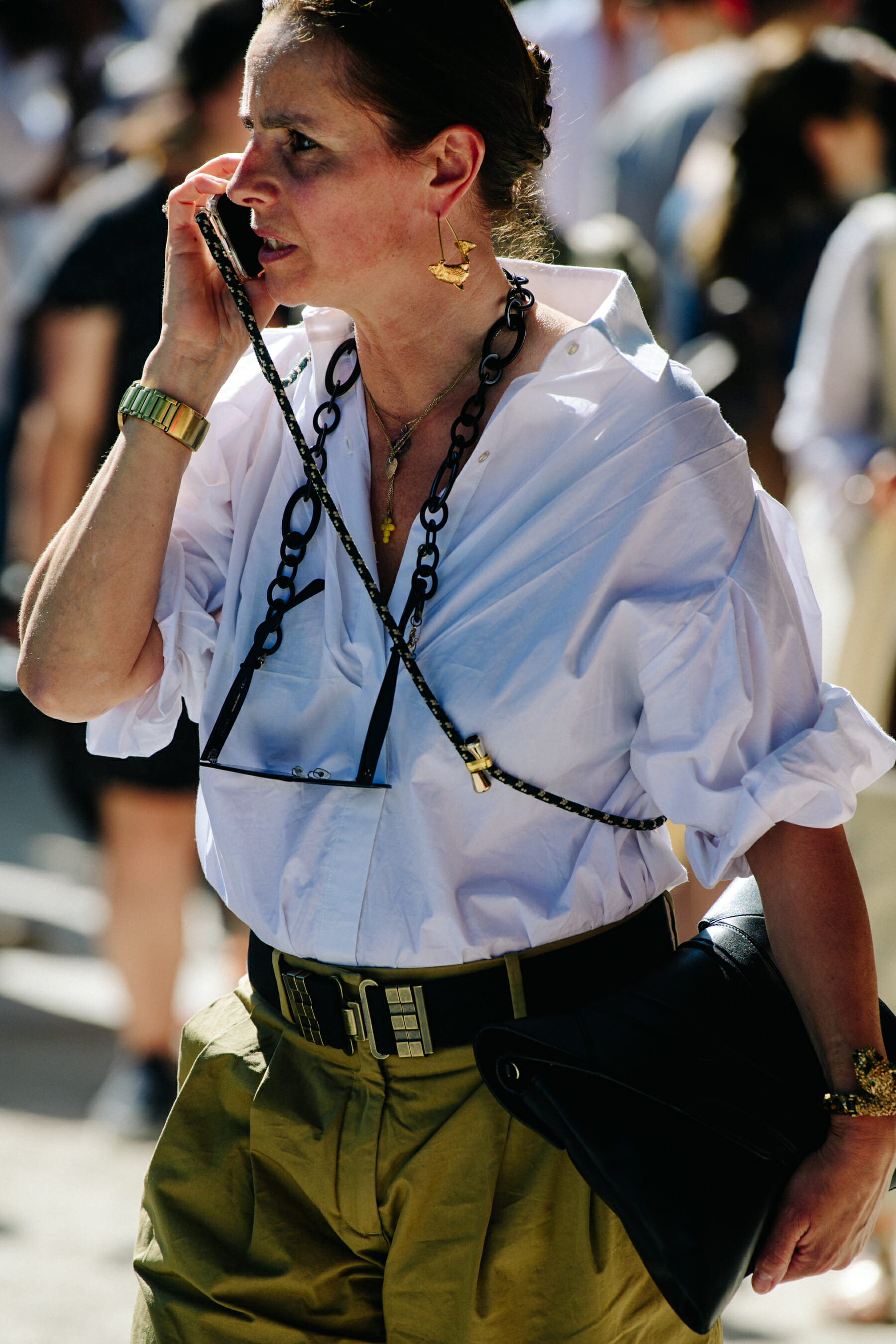 Woman wearing baggy white shirt