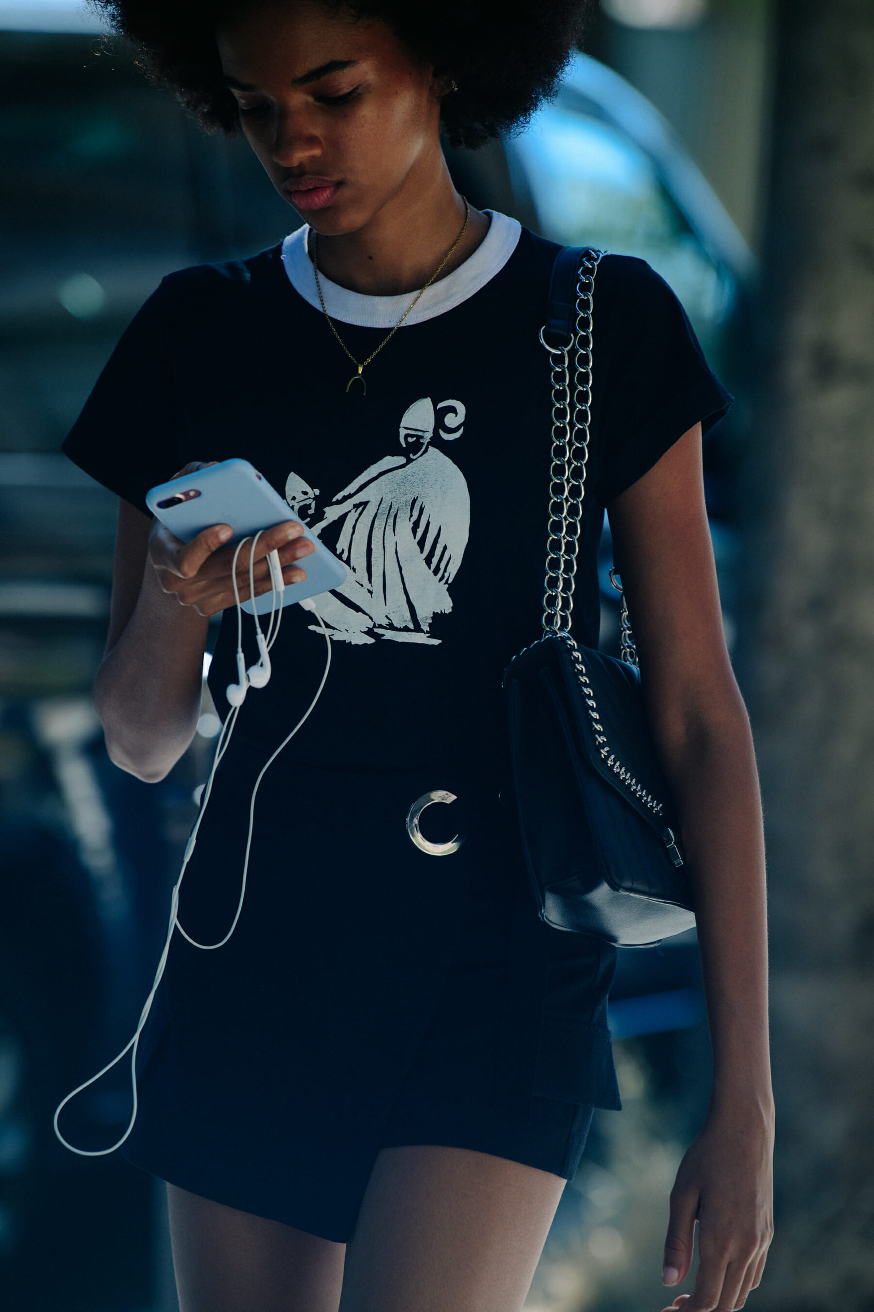 Model wearing black outfit