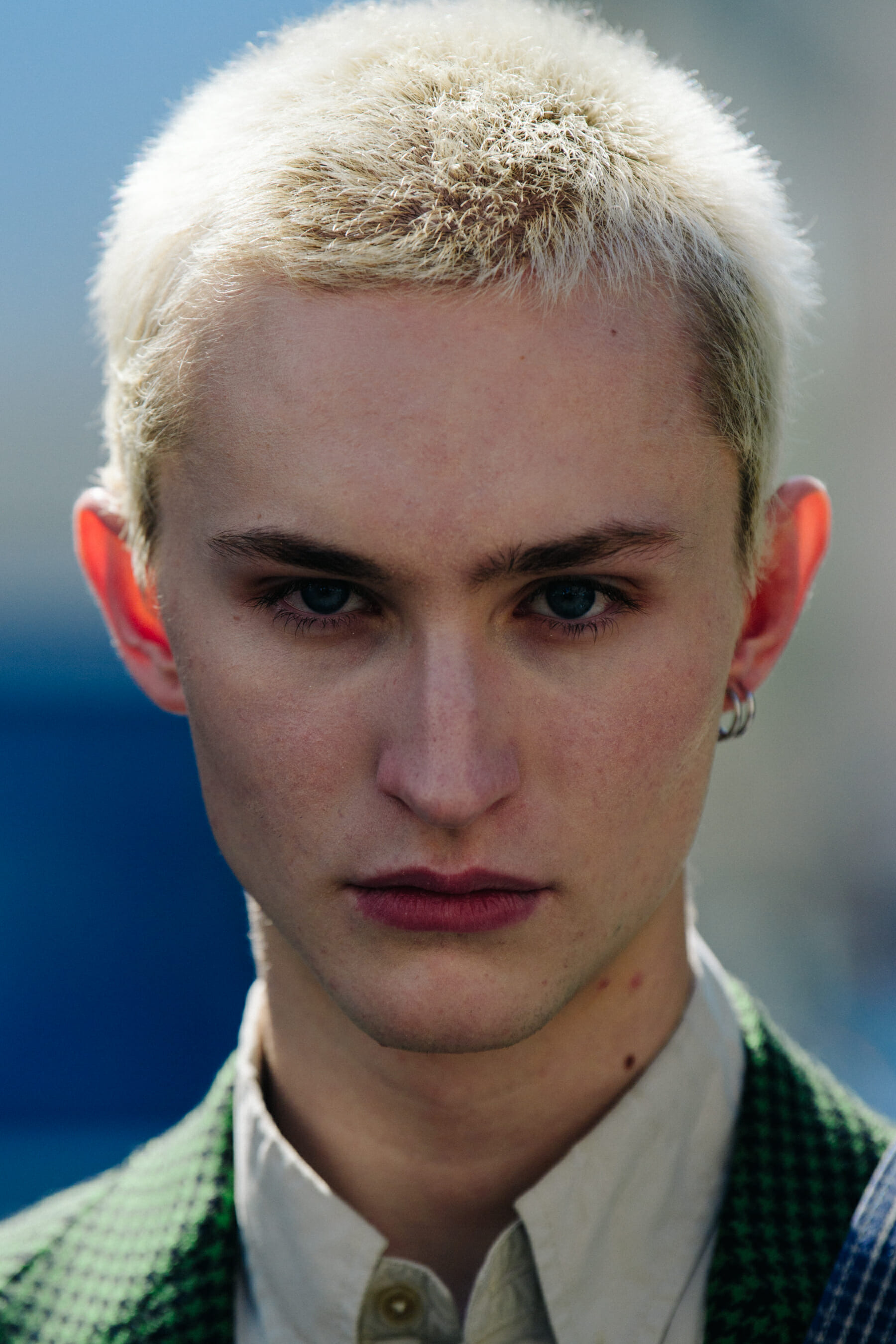 Portrait of model with short blonde hair