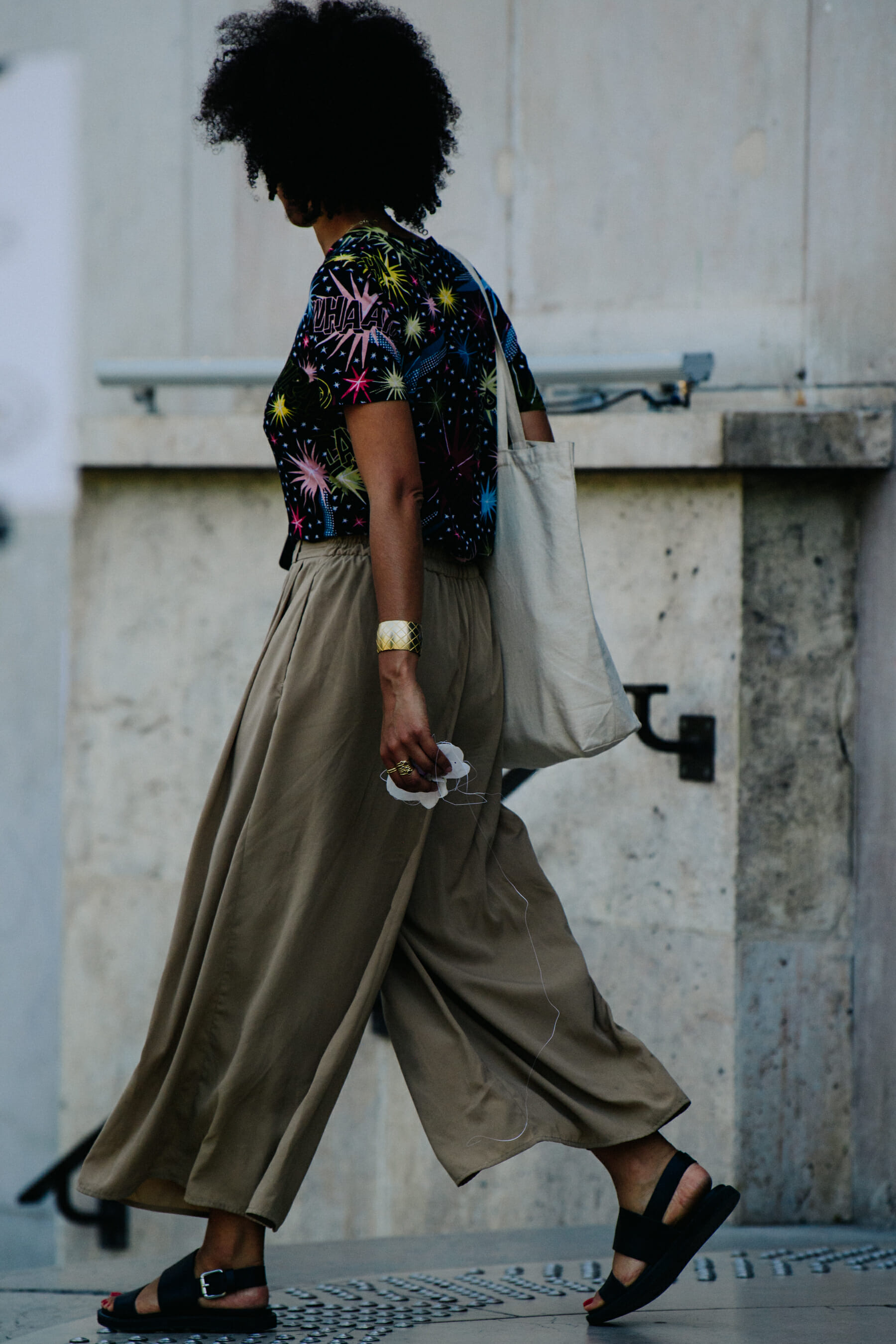Woman wearing wide tan pants