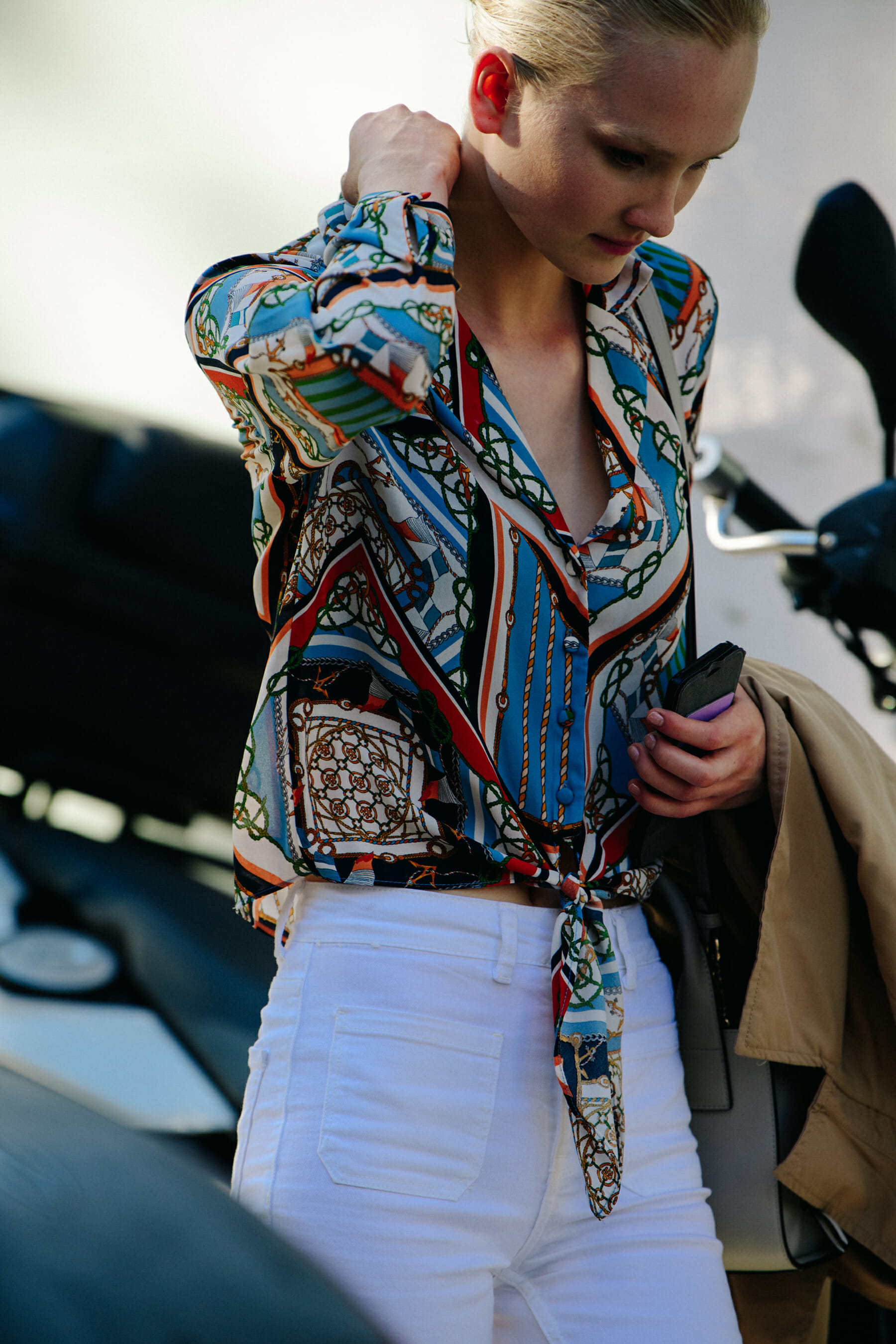 Model wearing white jeans