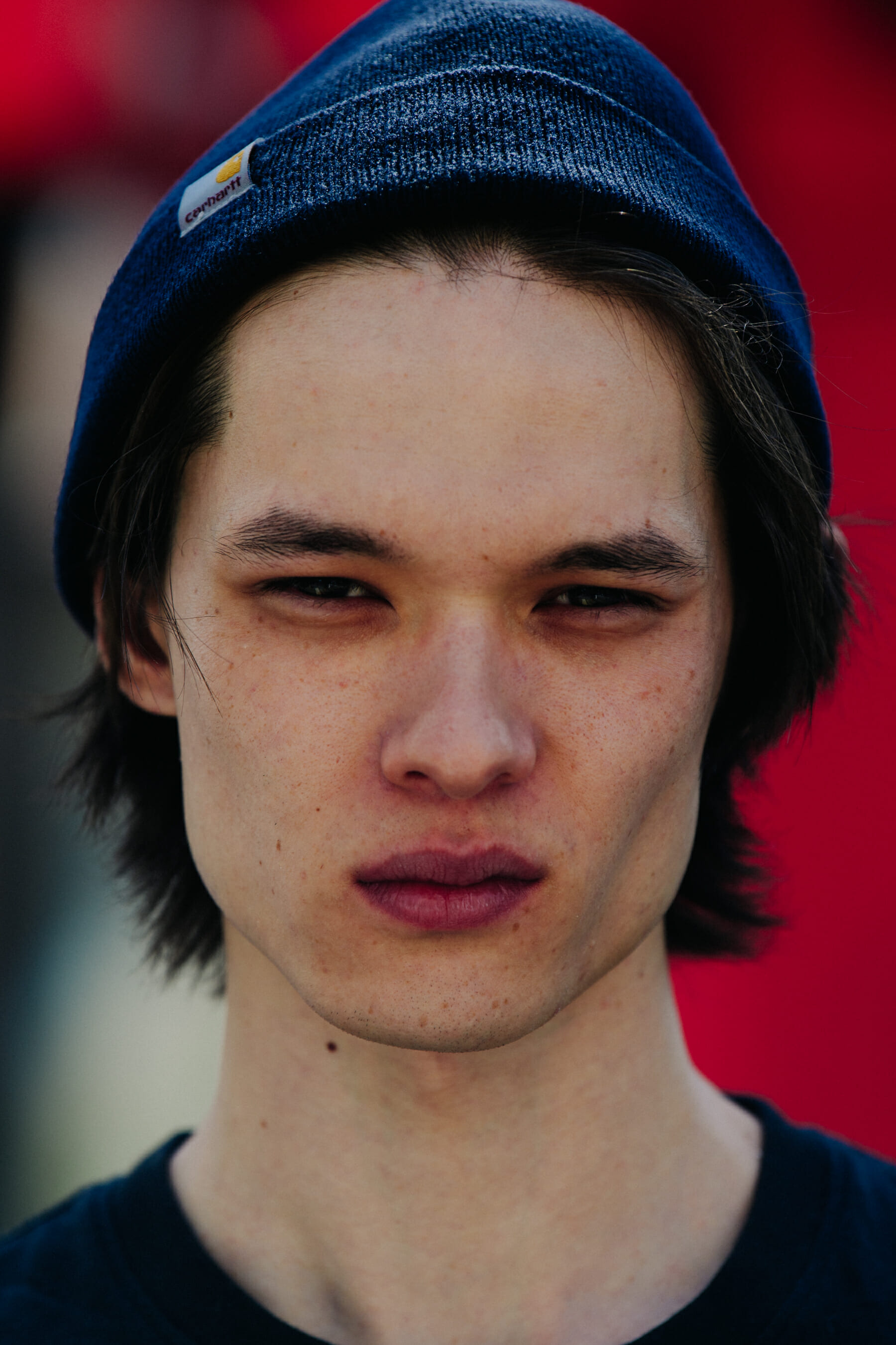 Portrait of model wearing blue beanie