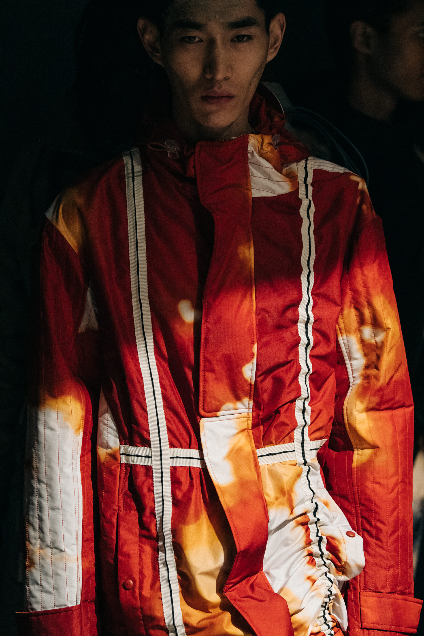 Model wearing orange at A Cold Wall