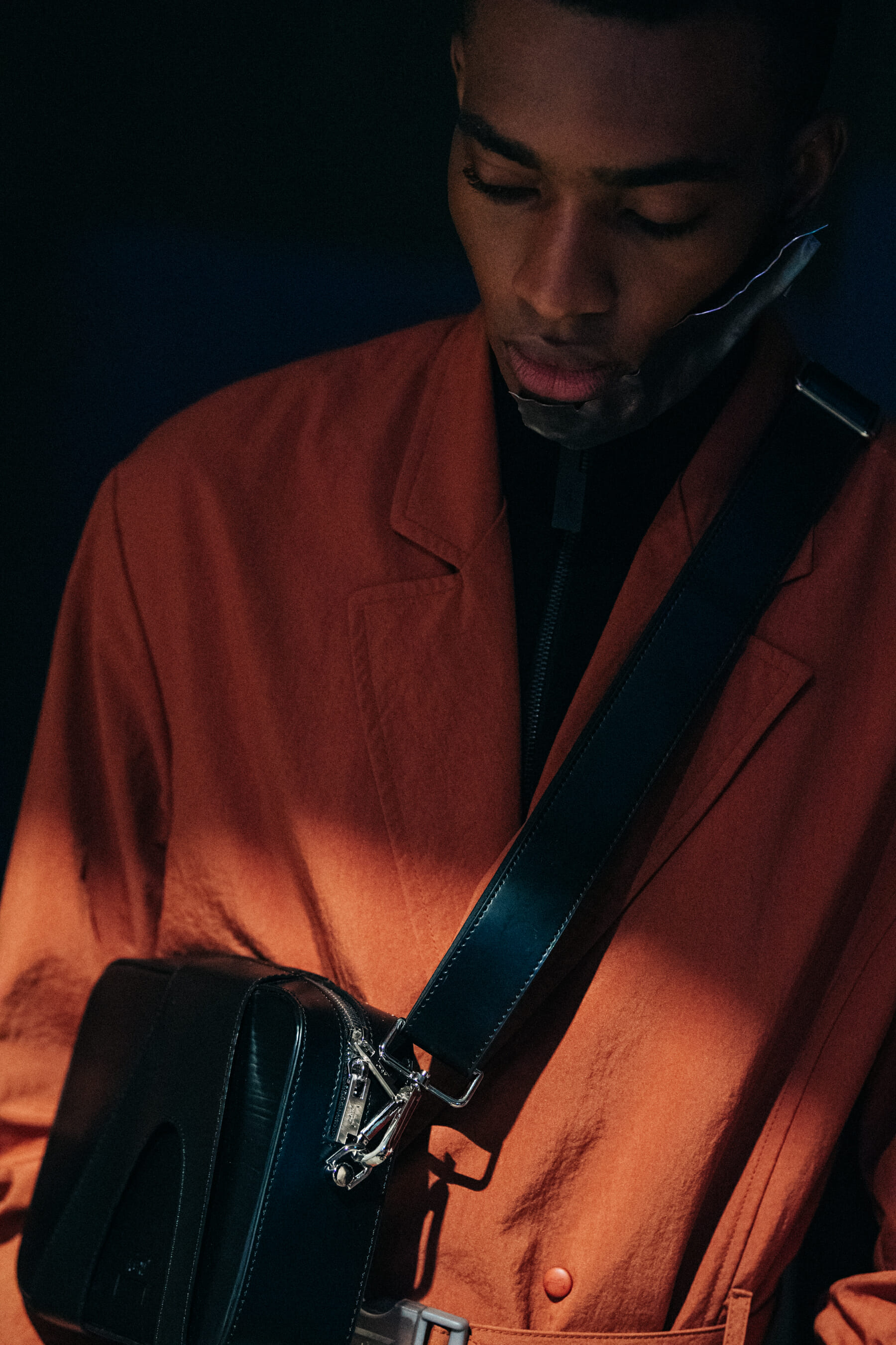 Model wearing orange at A Cold Wall