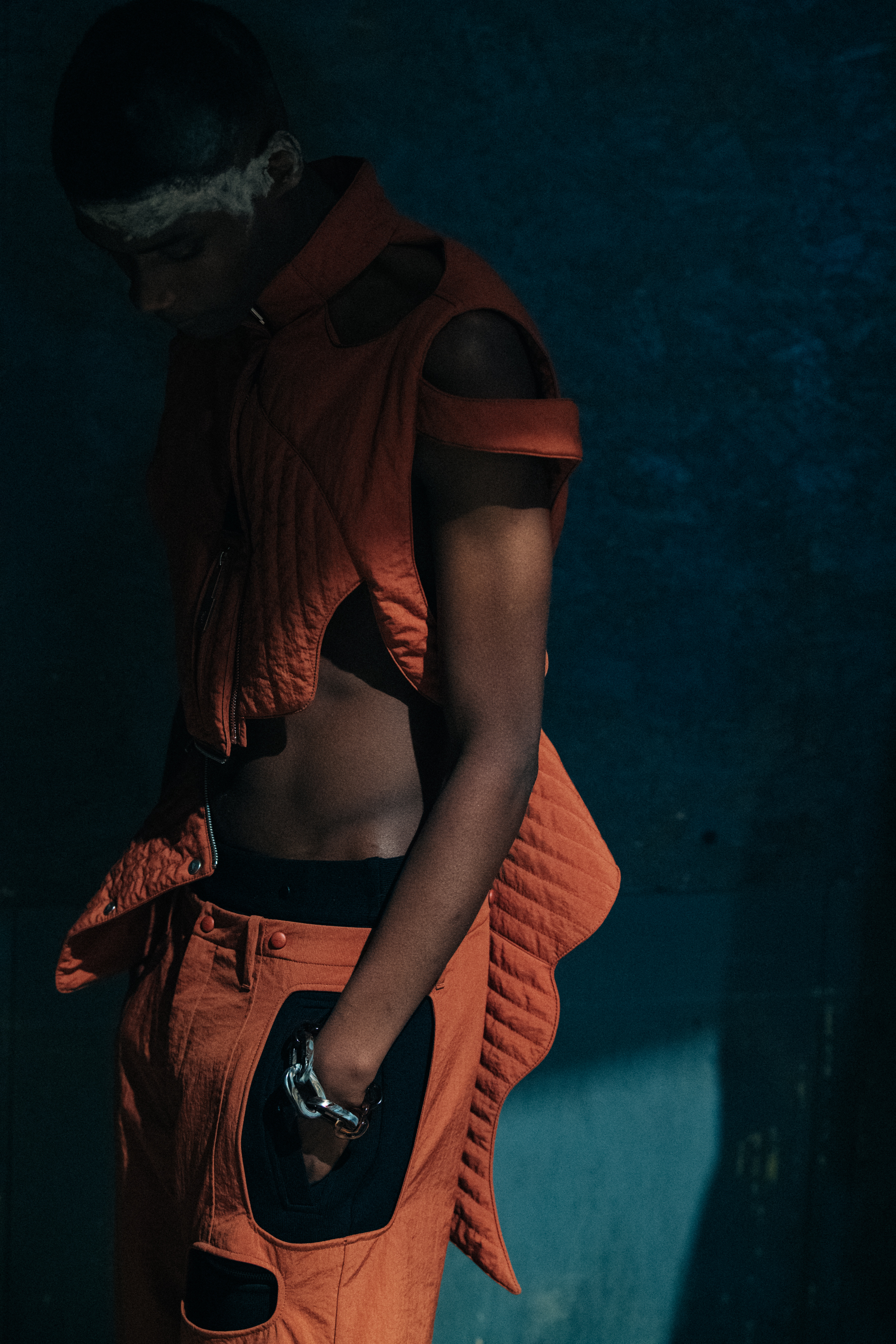 Model wearing orange at A Cold Wall
