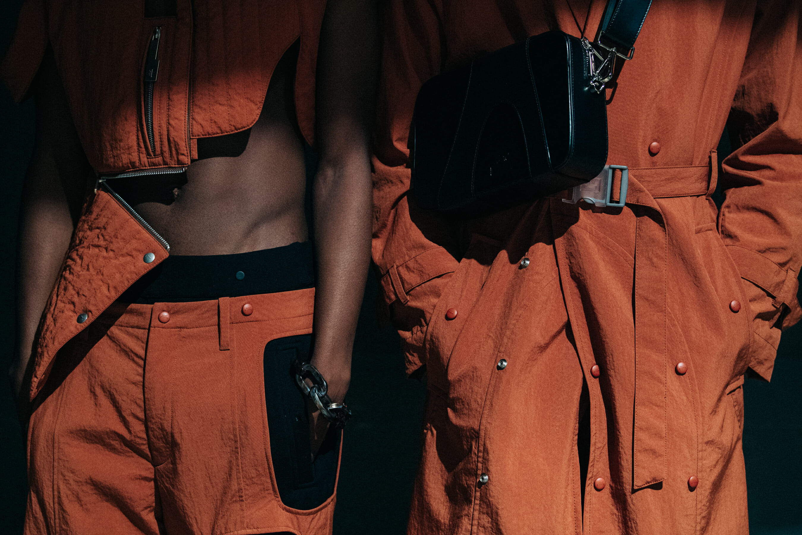 Model wearing orange at A Cold Wall