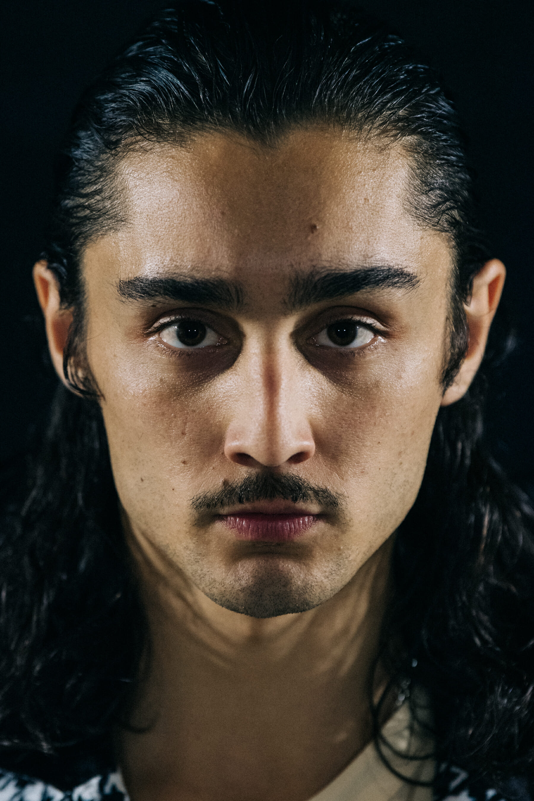 Portrait of model with slick hair