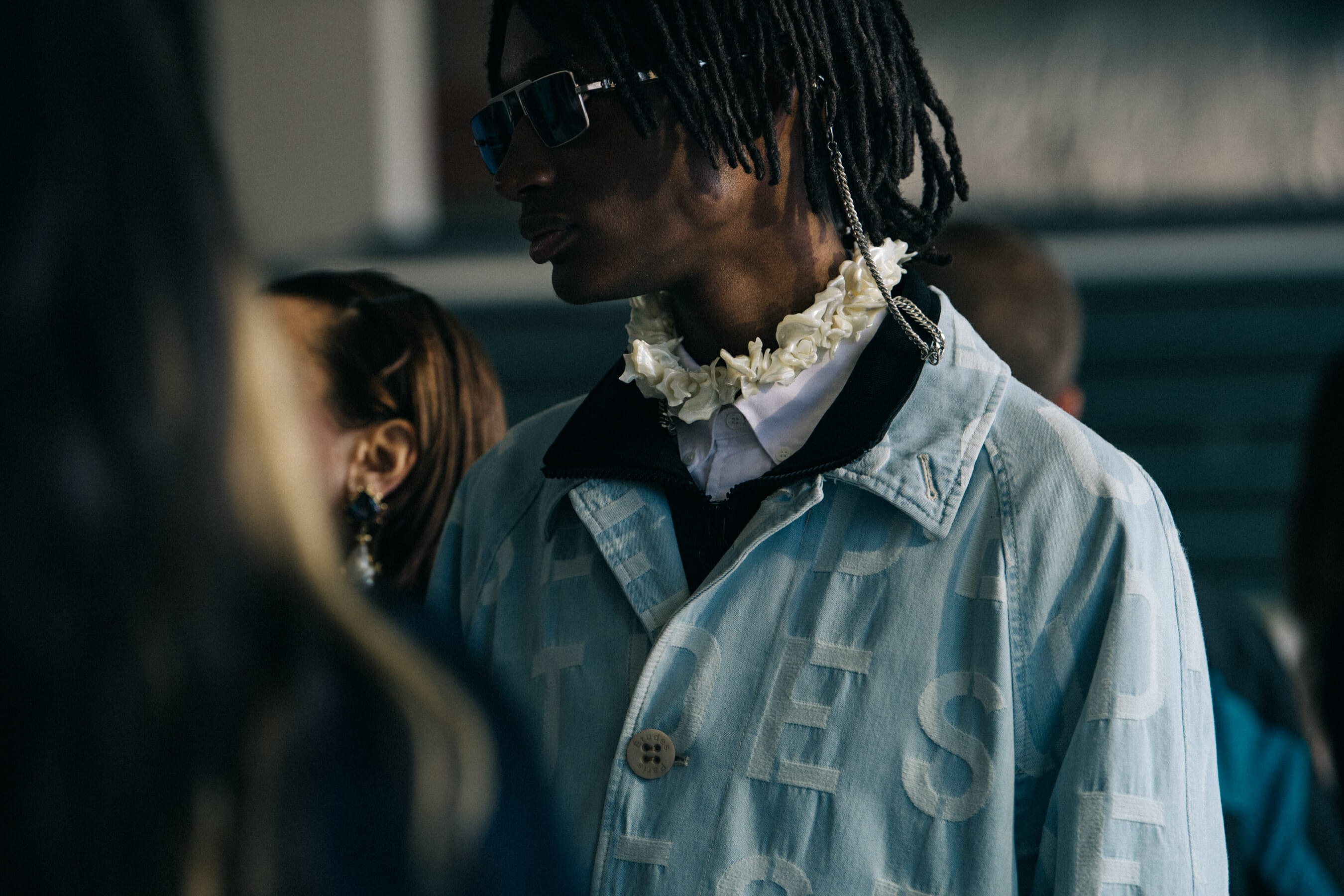 Model wearing sunglasses at Etudes
