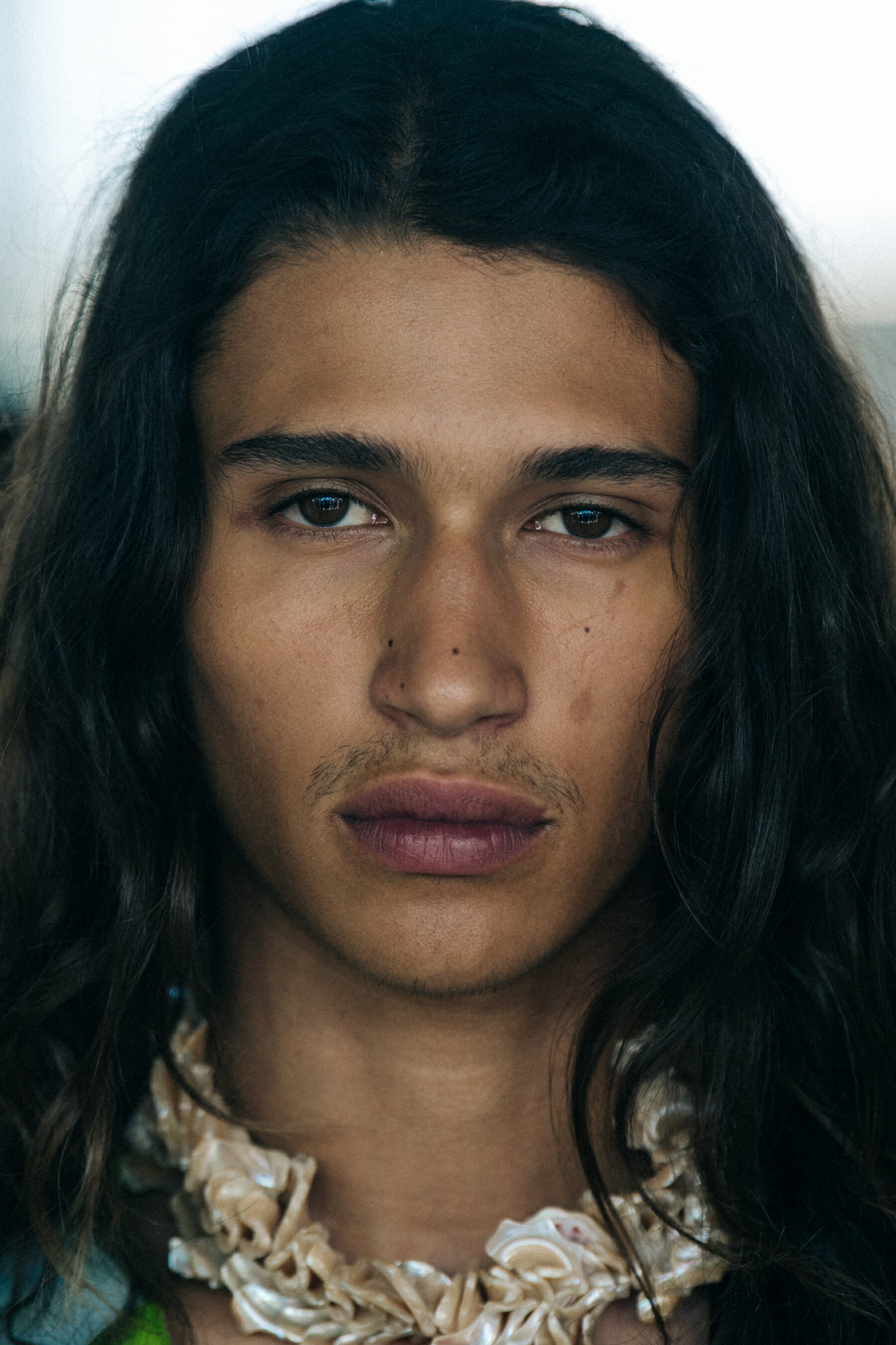 Portrait of model with long hair at Etudes