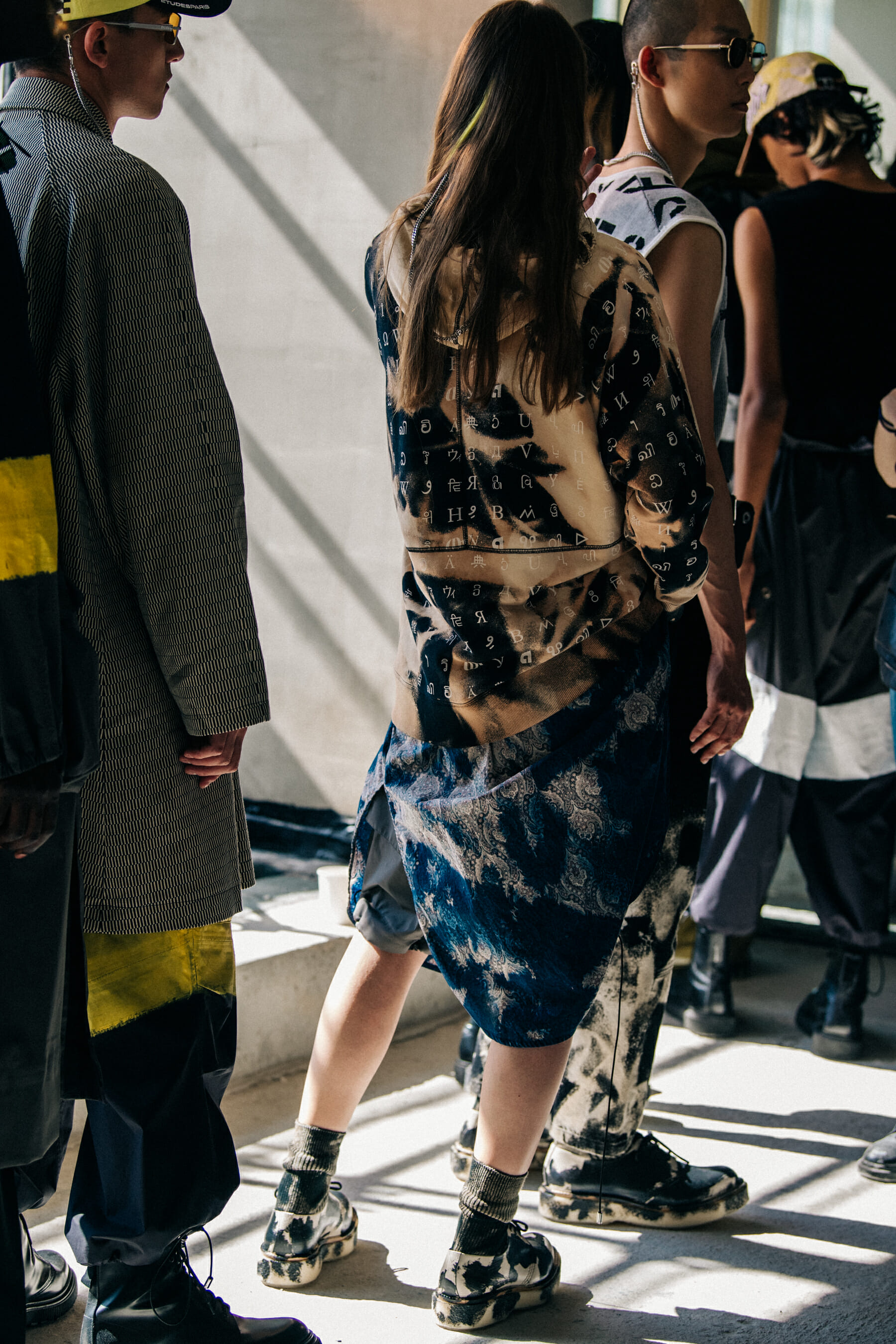 Model wearing colourful outfit at Etudes