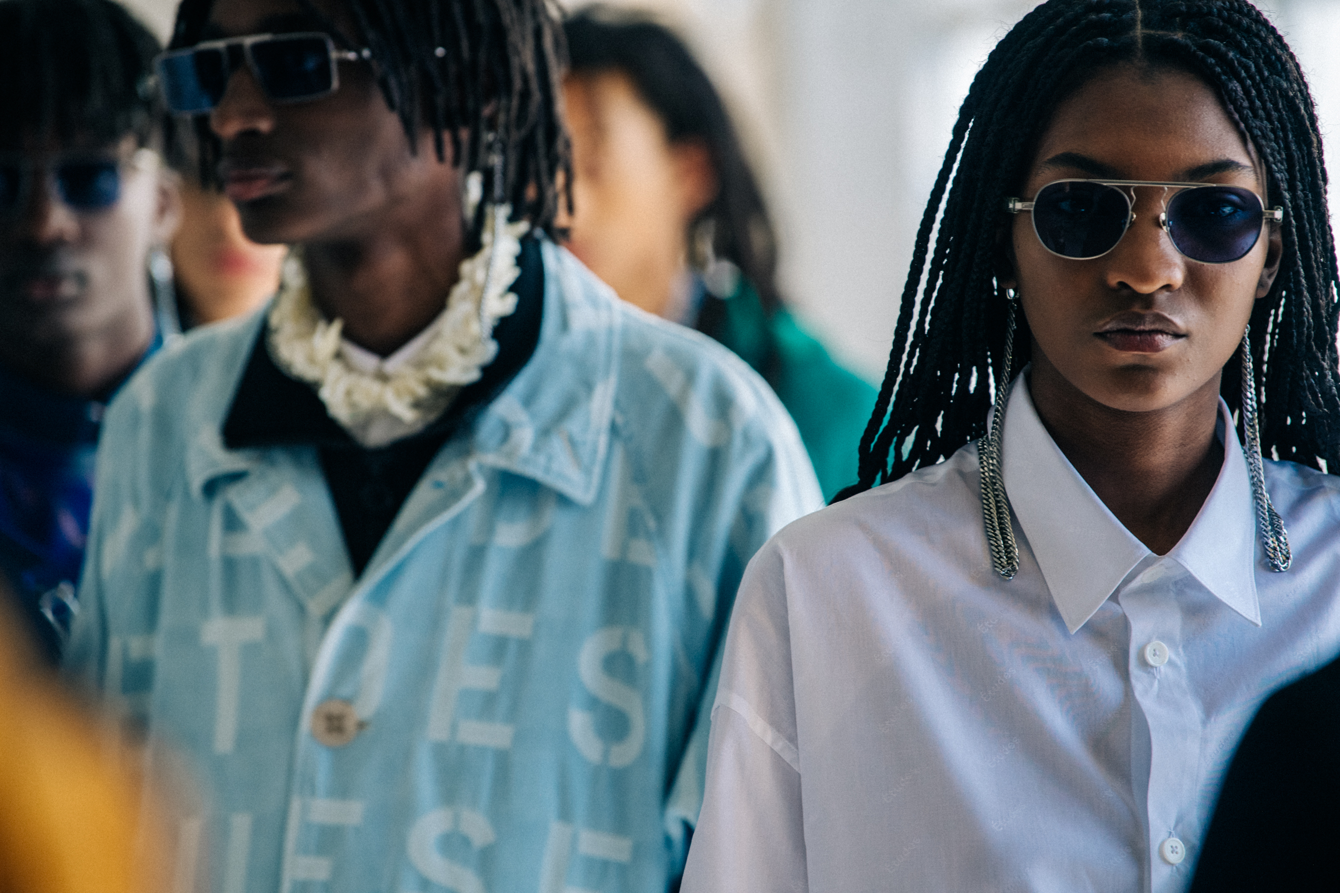 Model wearing sunglasses at Etudes