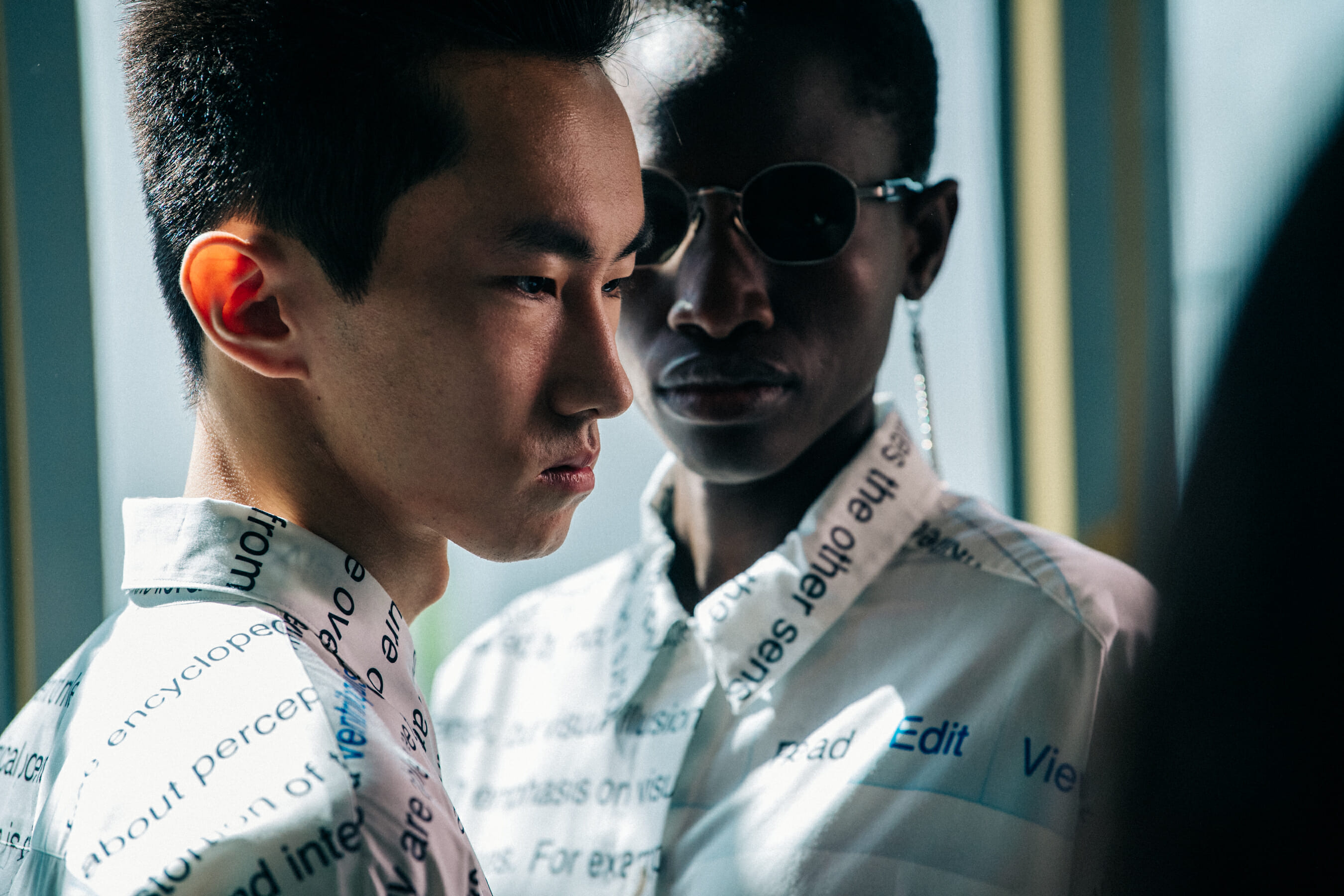 Model wearing sunglasses at Etudes