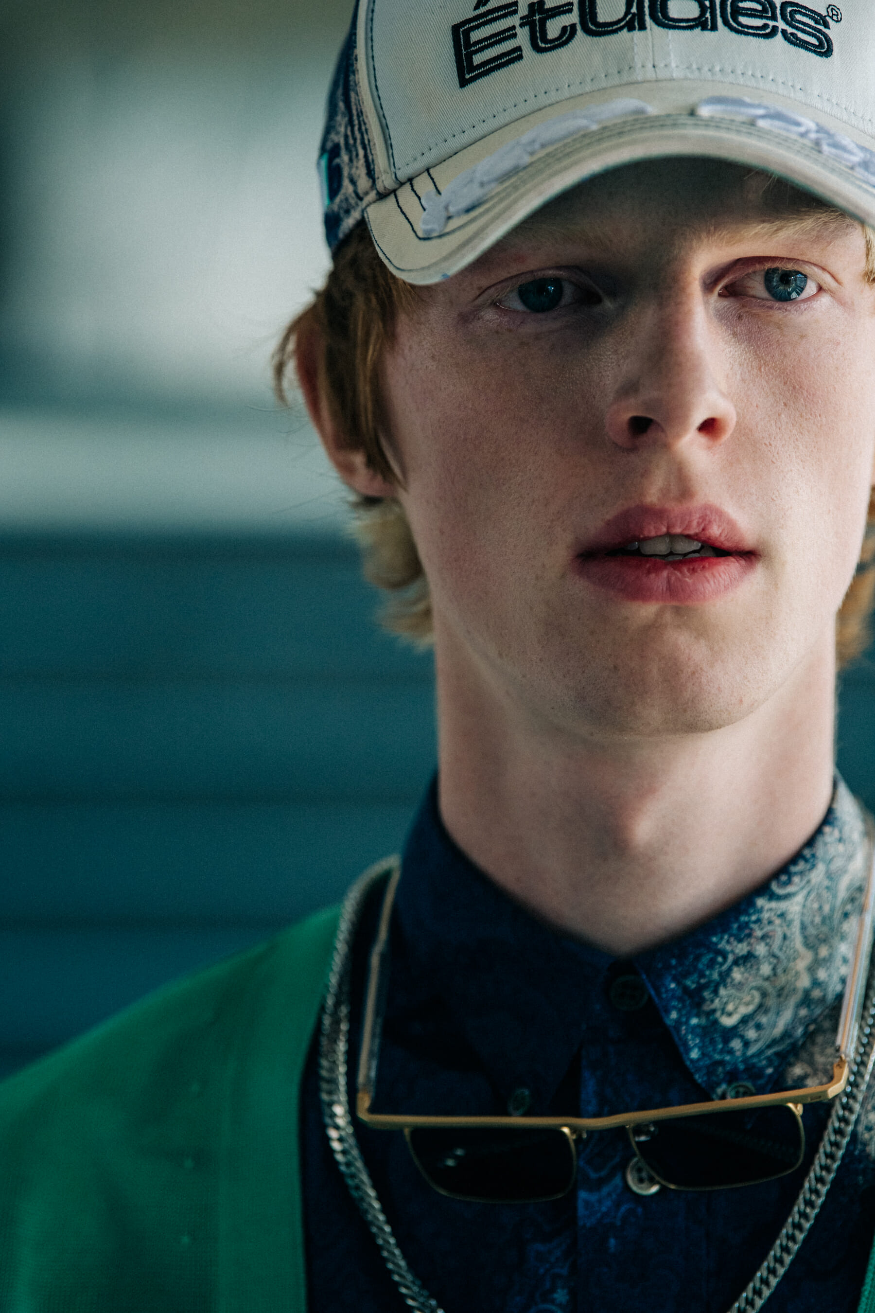 Model wearing cap at Etudes