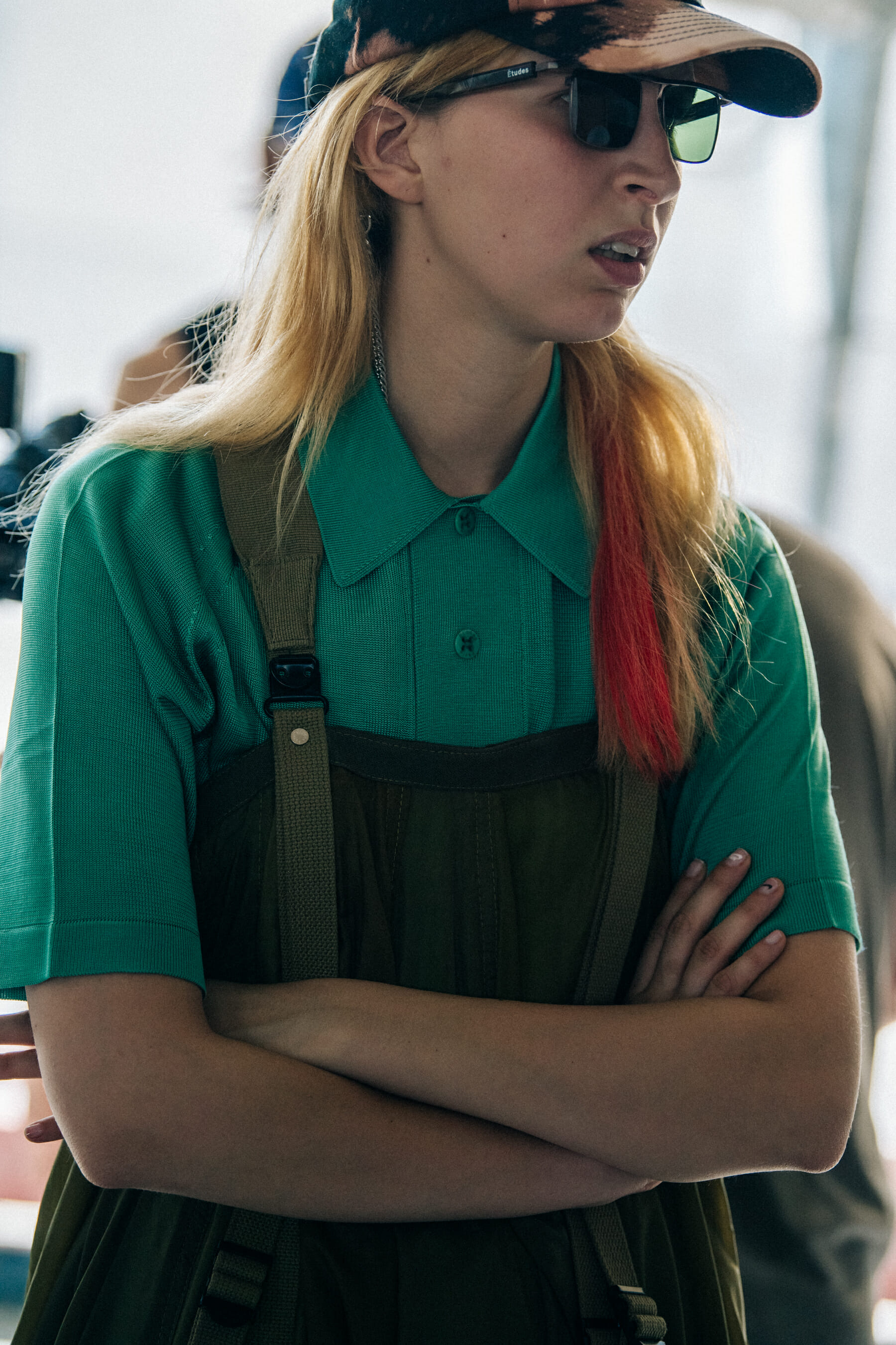 Model wearing cap at Etudes