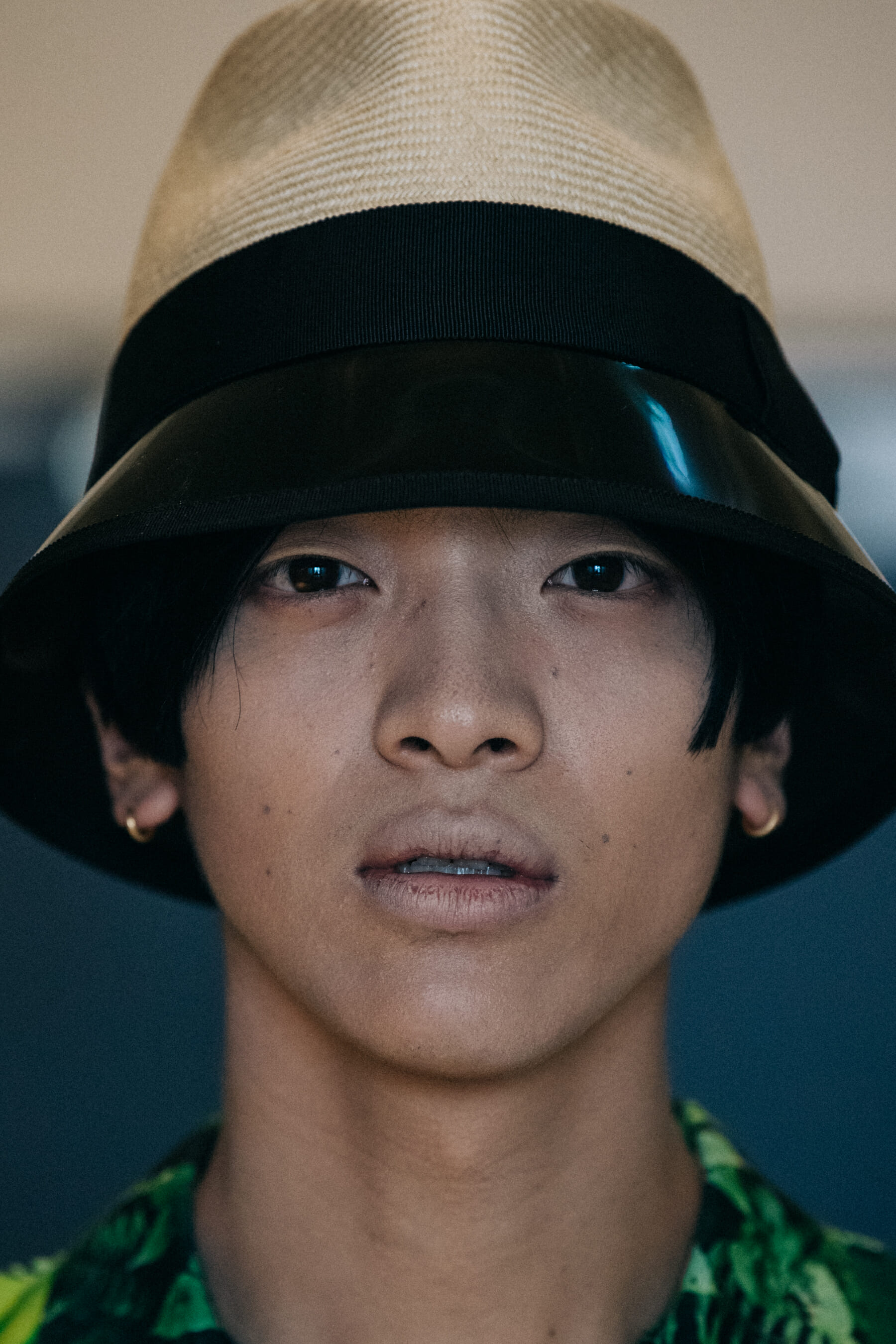 Portrait of model wearing straw hat