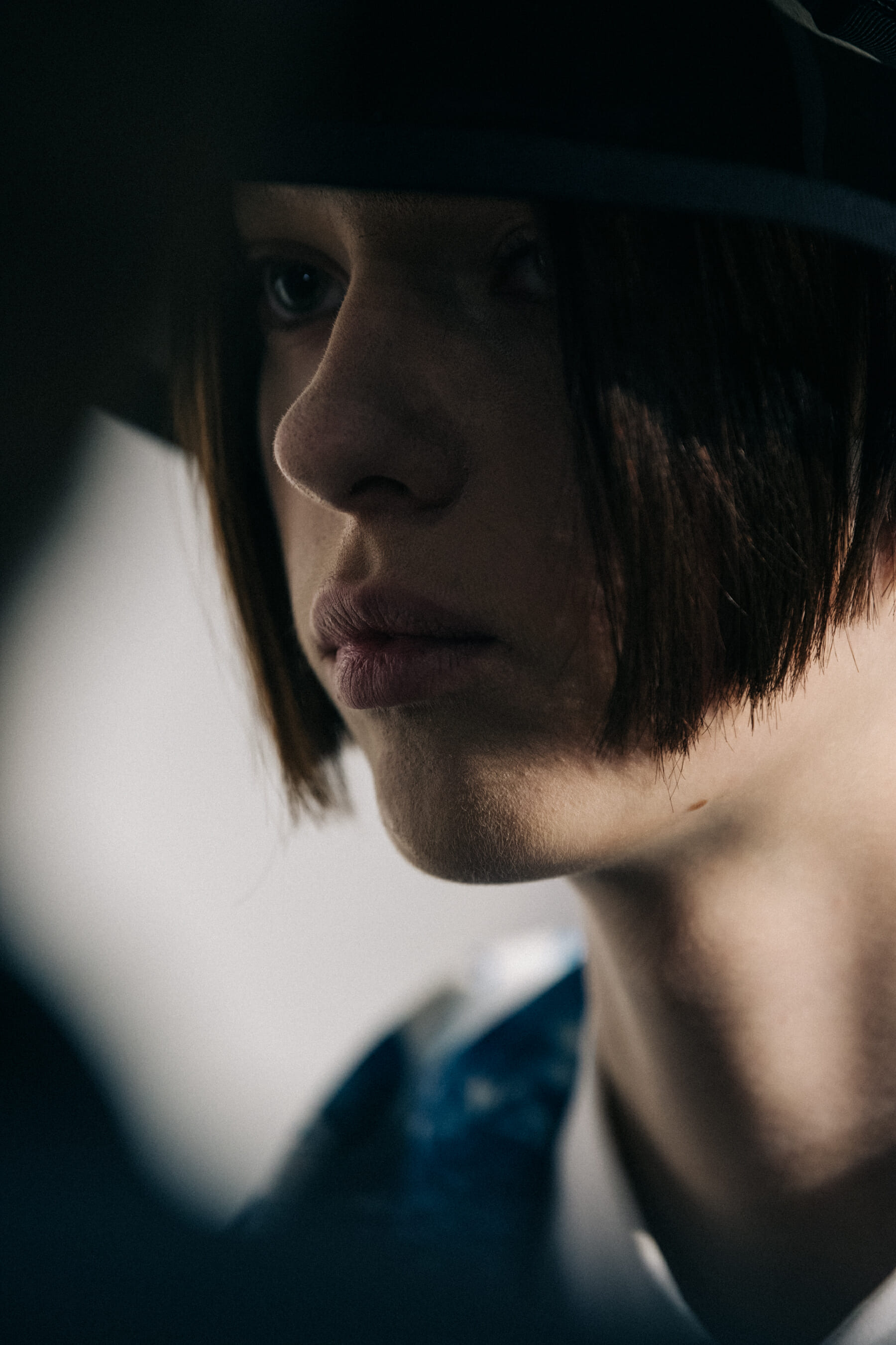 Model wearing straw hat backstage at Fumito Ganyru