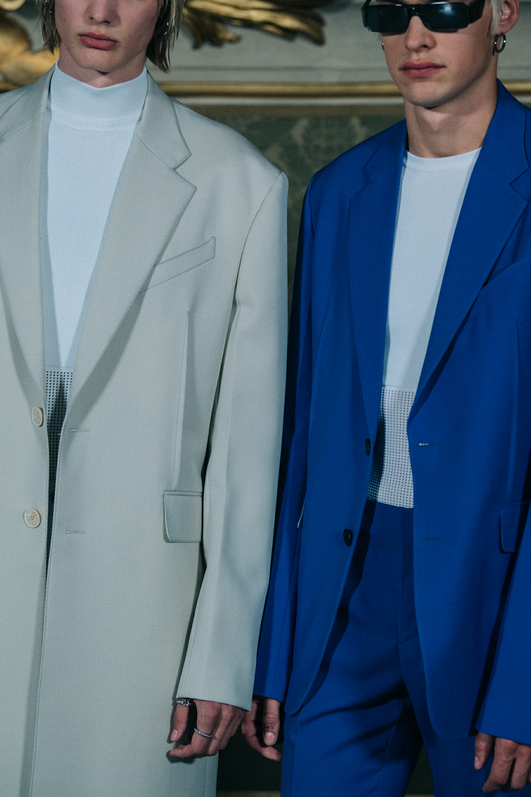 Models wearing Givenchy outfits backstage