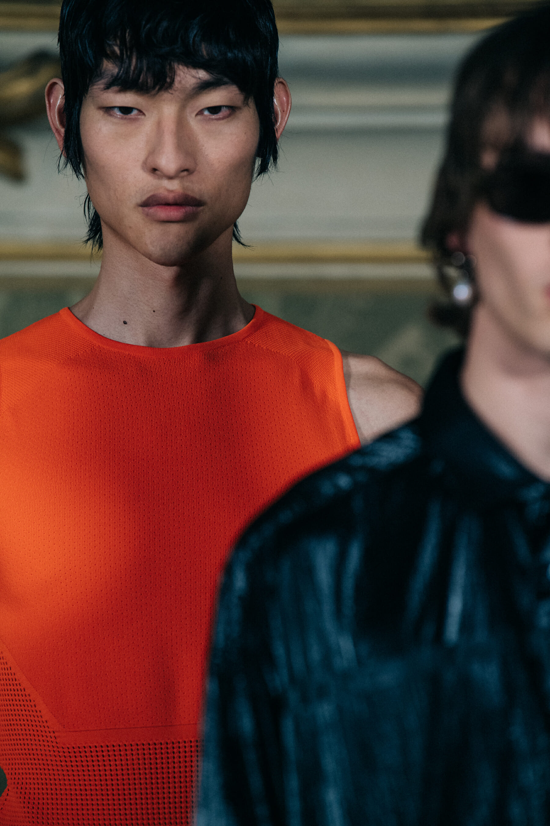 Models wearing Givenchy outfits backstage