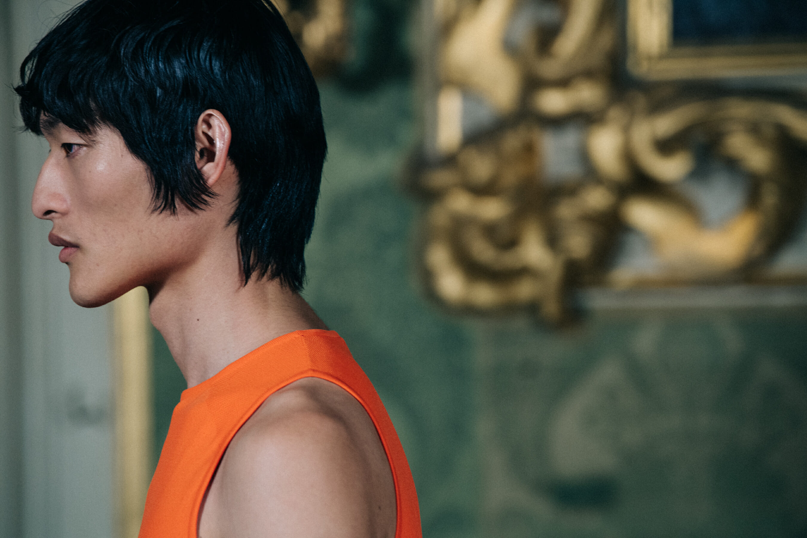Models wearing Givenchy outfits backstage