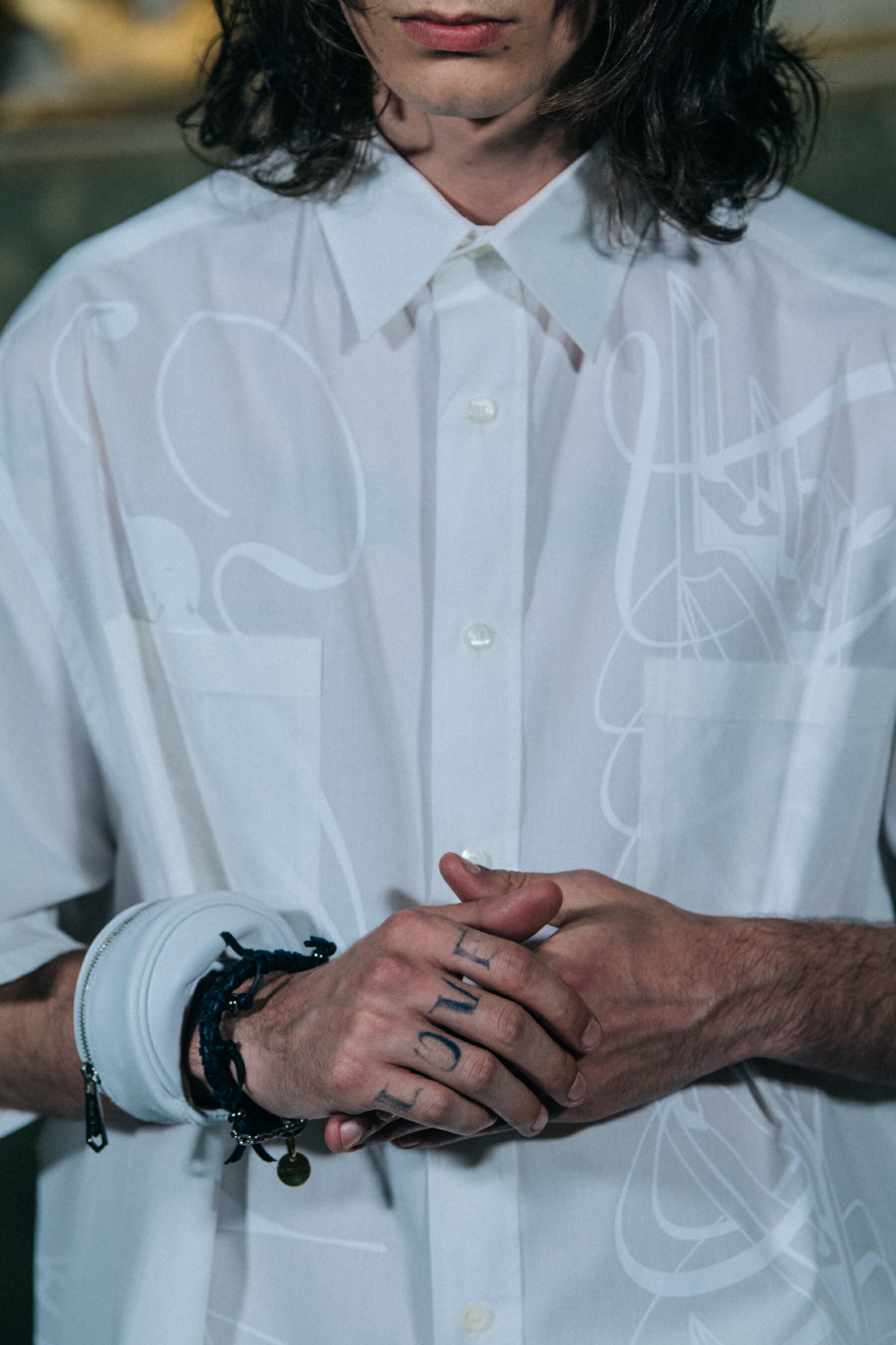 Models wearing Givenchy outfits backstage