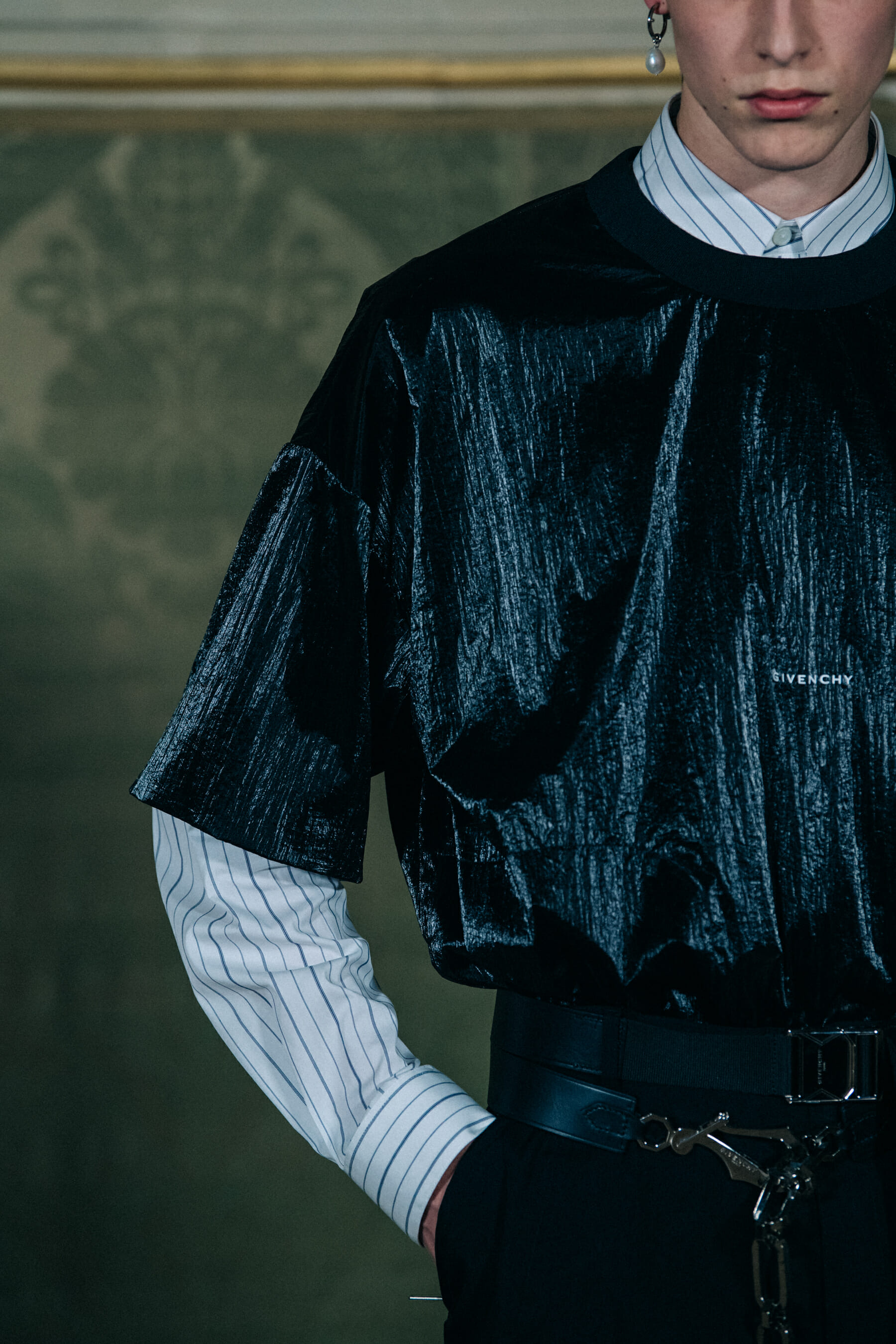 Models wearing Givenchy outfits backstage