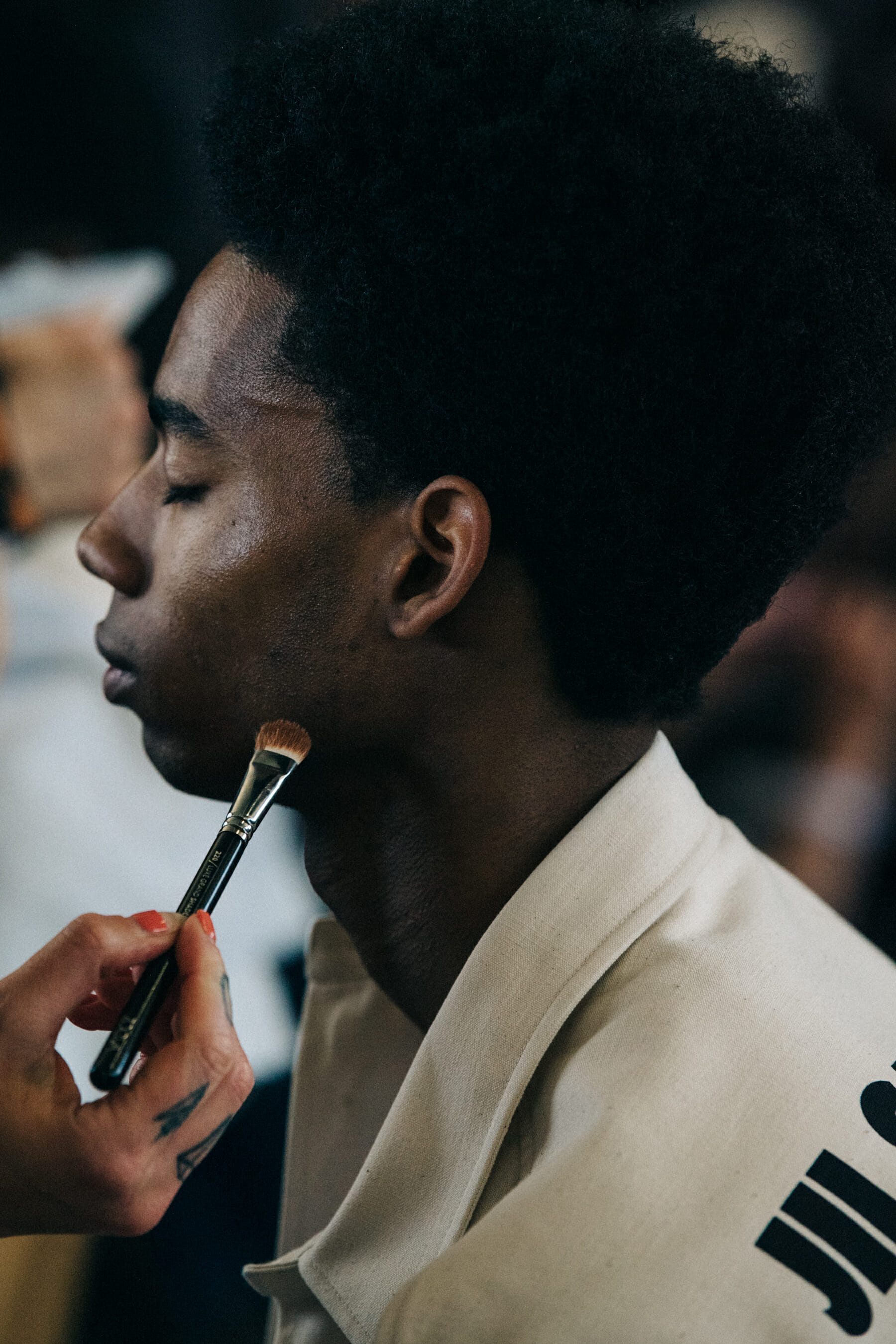 Keiron Caynes backstage at Jil Sander