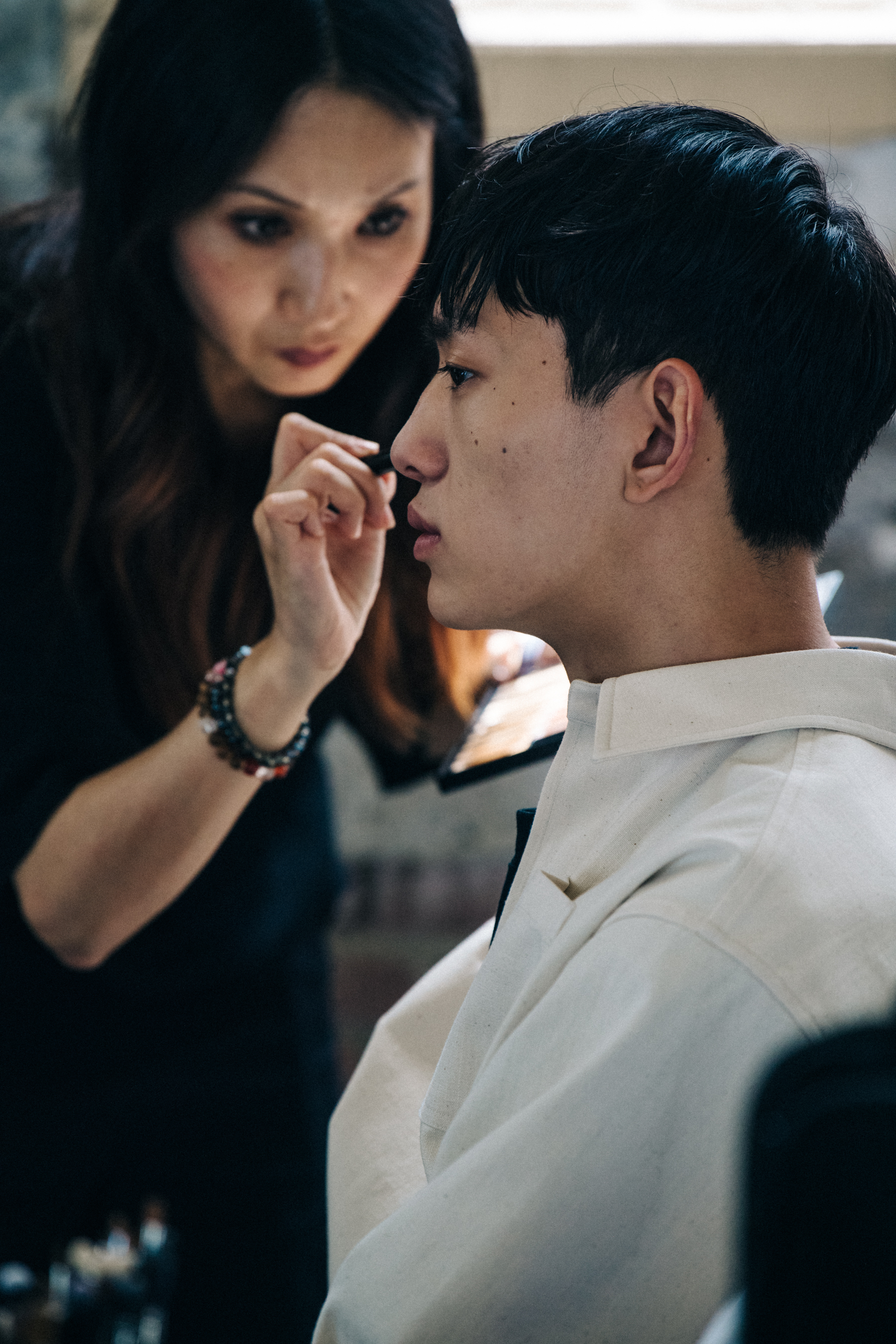Model in hair and makeup at Jil Sander