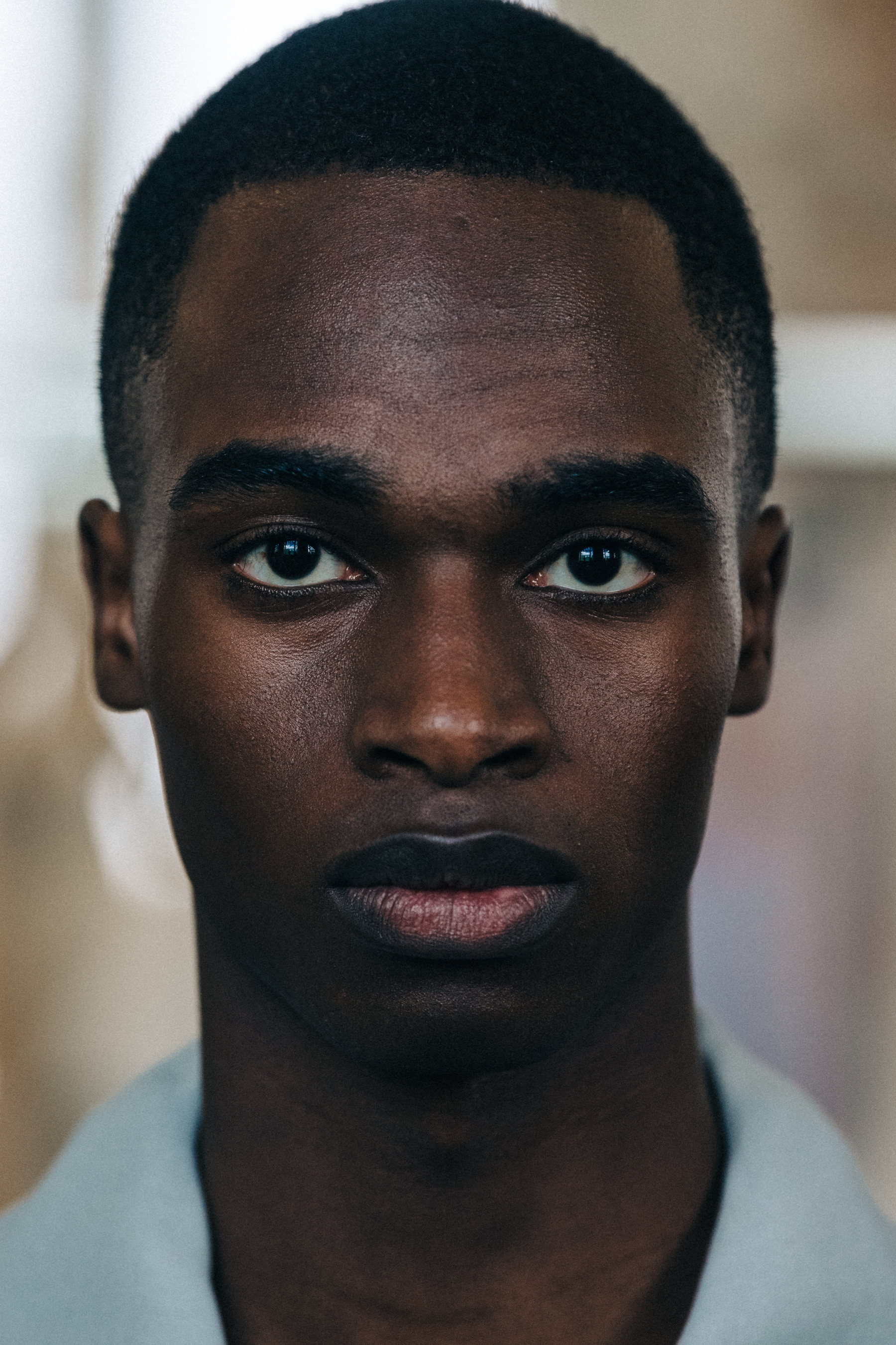 Bakay Diaby backstage at Jil Sander