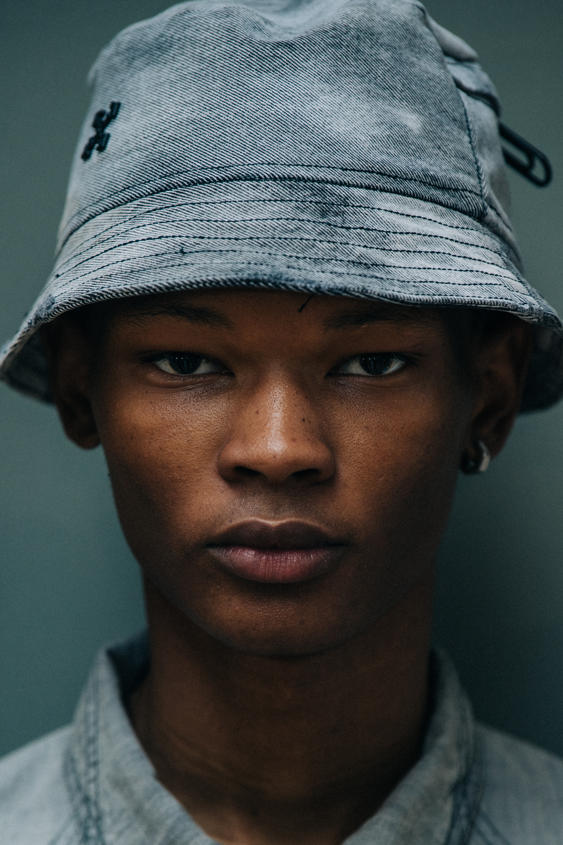 Portrait of model wearing bucket hat
