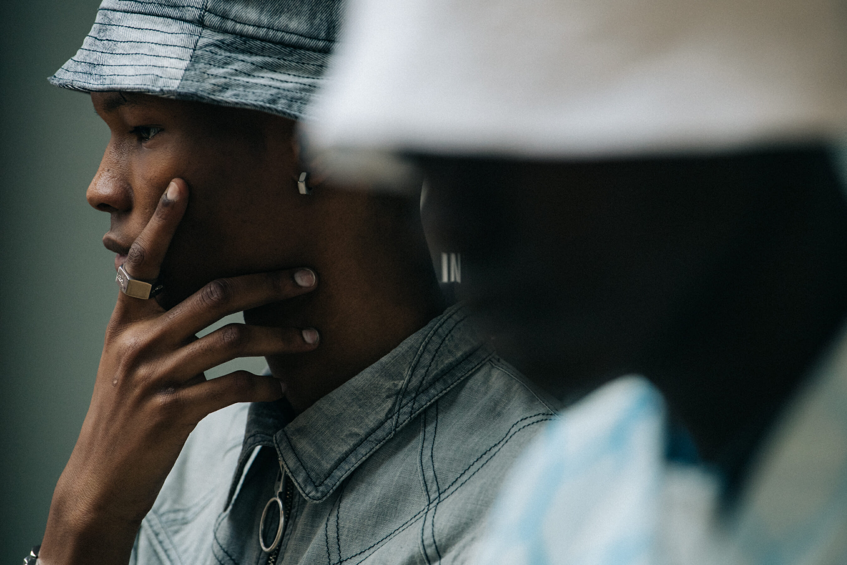 Model wearing bucket hat at Off-White