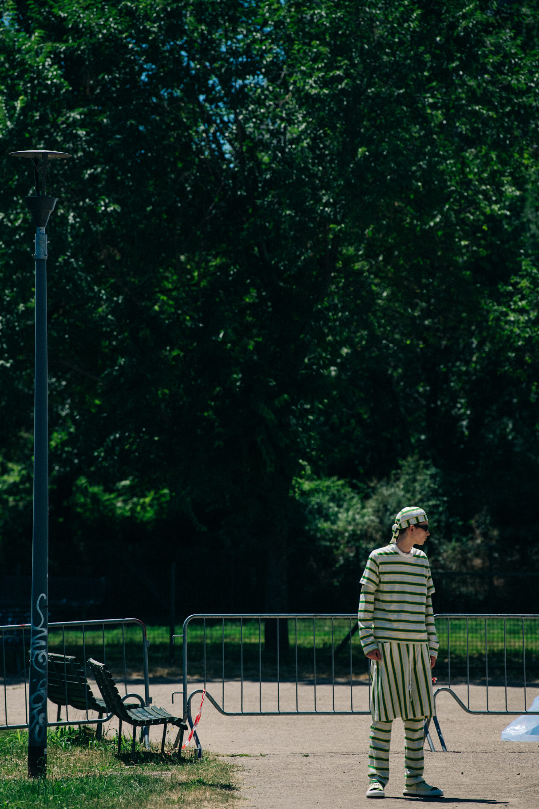 Model wearing striped Sunnei outfit