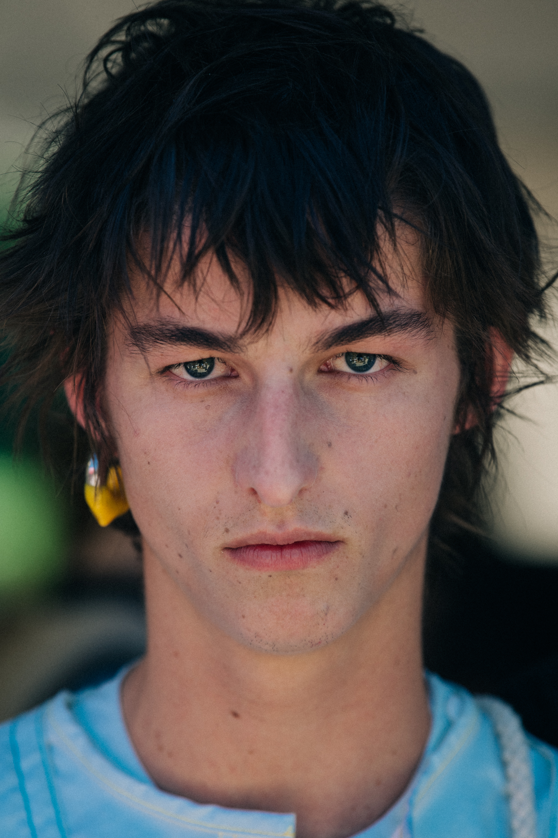 Portrait of model with thick dark hair