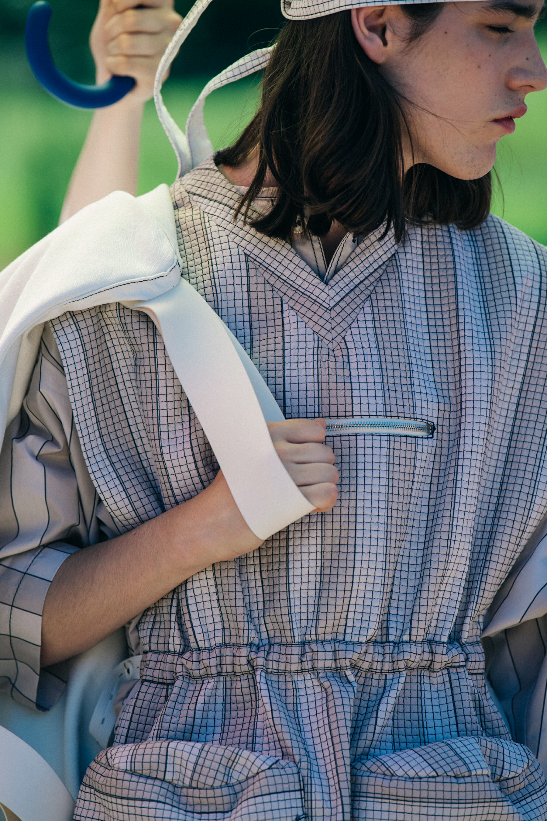 Model wearing striped Sunnei outfit